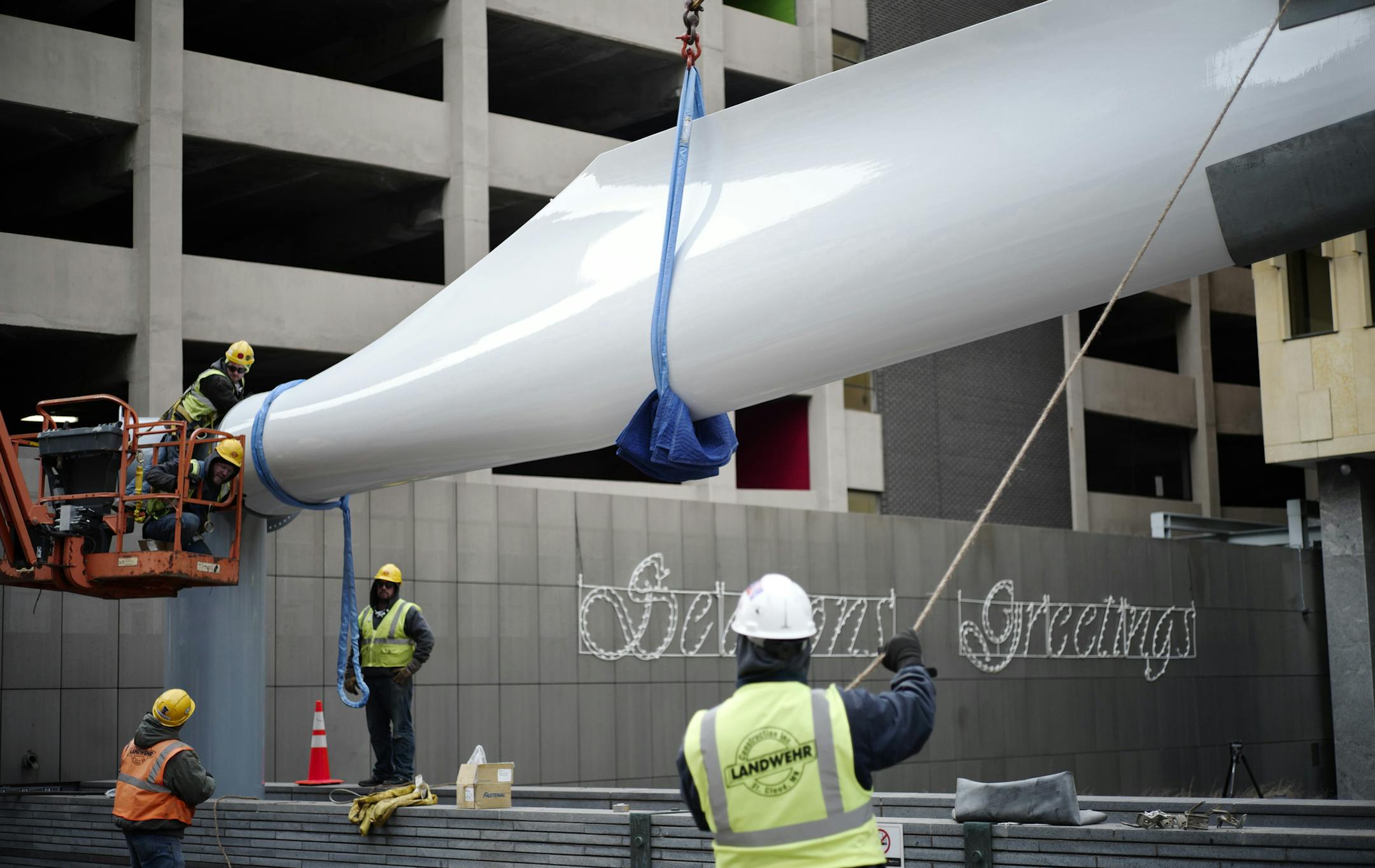 Xcel installs a real wind turbine blade outside its headquarters on Nicolllet Mall in a commerce as display in time for the Super Bowl.] Richard Tsong-Taatarii/rtsong-taatarii@startribune.com