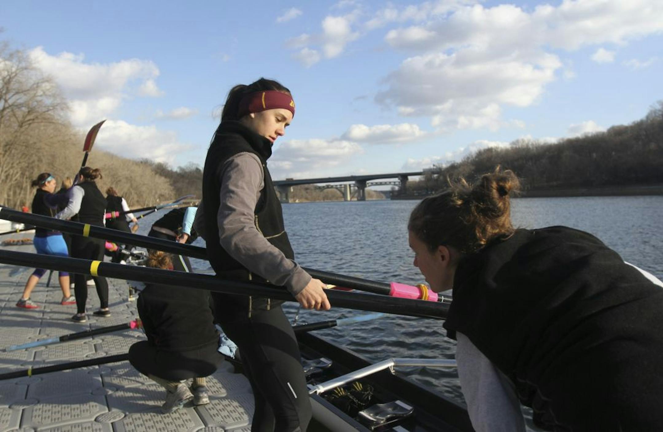 Unseasonably warm weather gave an extra practice day to members of the University of Minnesota women's rowing team Thursday.