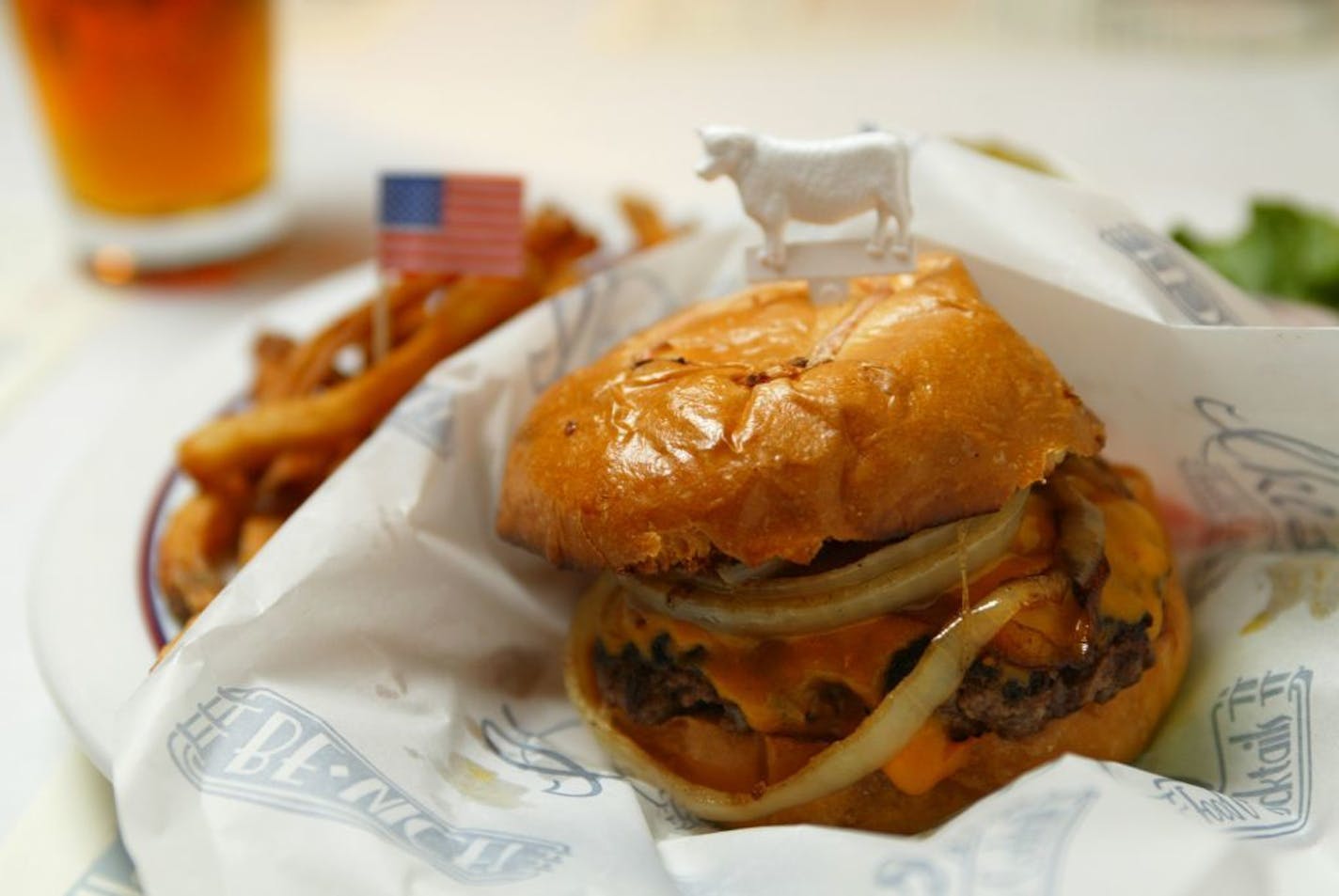 Ike's Burger, as prepared Monday night at Ike's Food & Cocktails. GENERAL INFORMATION: MINNEAPOLIS - Ike's Food & Cocktails at 50 S. Sixth St. is a new bar and grill in downtown Minneapolis.