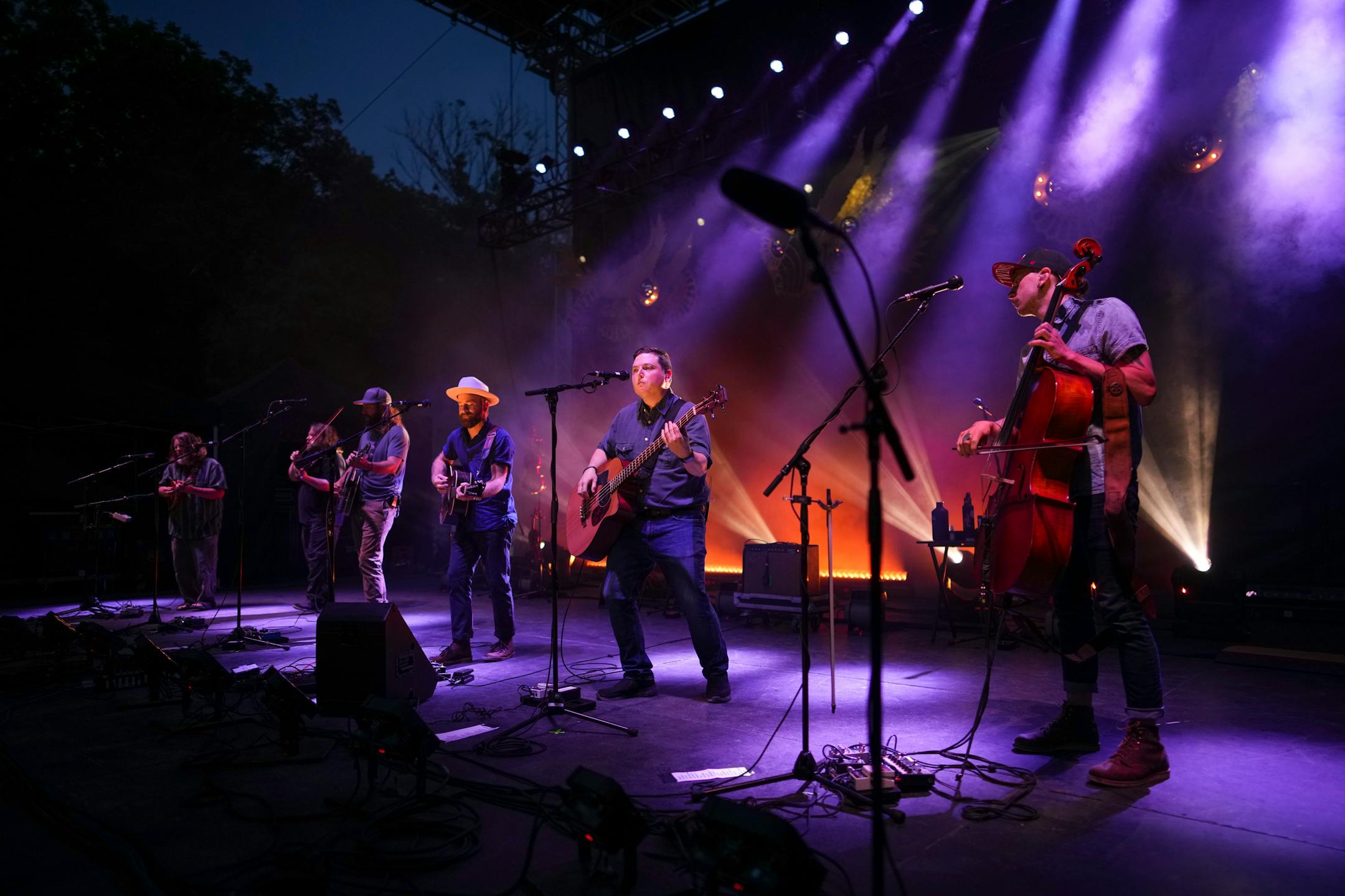Trampled By Turtles during the first song of just their third show since their return to touring post-pandemic. They are, from left, Erik Berry, Ryan Young, Dave Carroll, Dave Simonett, Tim Saxhaug, and Eamonn McLain. ] JEFF WHEELER • jeff.wheeler@startribune.com