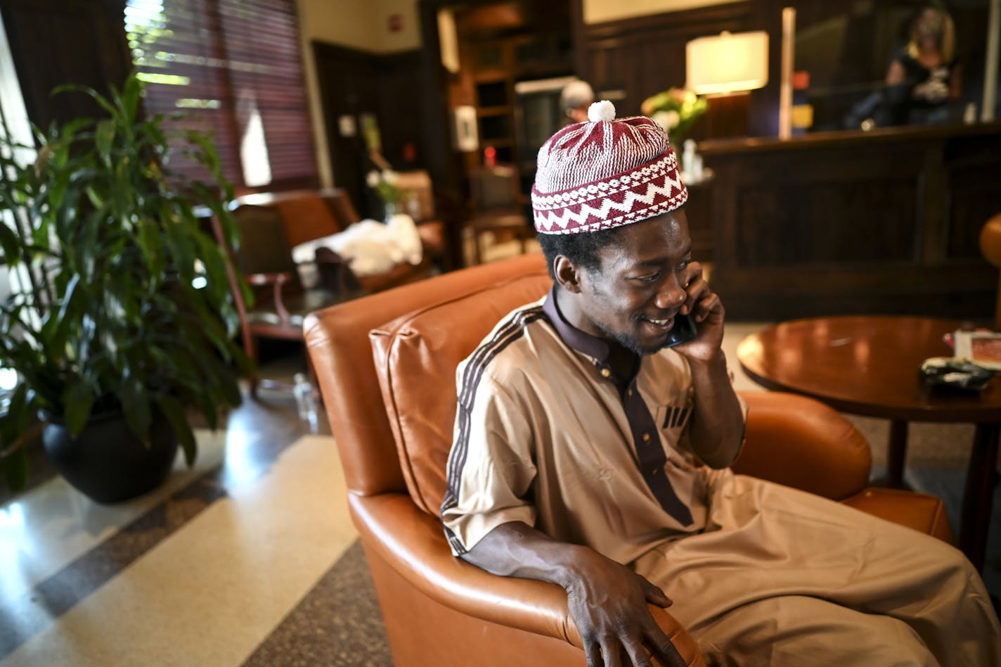 Abu Bakr, now a resident at the hotel, made a call in the lobby Wednesday afternoon. He was living in his car before last week's unrest, but his car was lit on fire. ]aaron.lavinsky@startribune.com When unrest broke out on Lake Street last week, an organized group of volunteers came together to secure a space for the homeless on the streets that were potentially in danger. That hotel became the Midtown Sheraton, which has since been turned into a sanctuary, with volunteers working around the clo