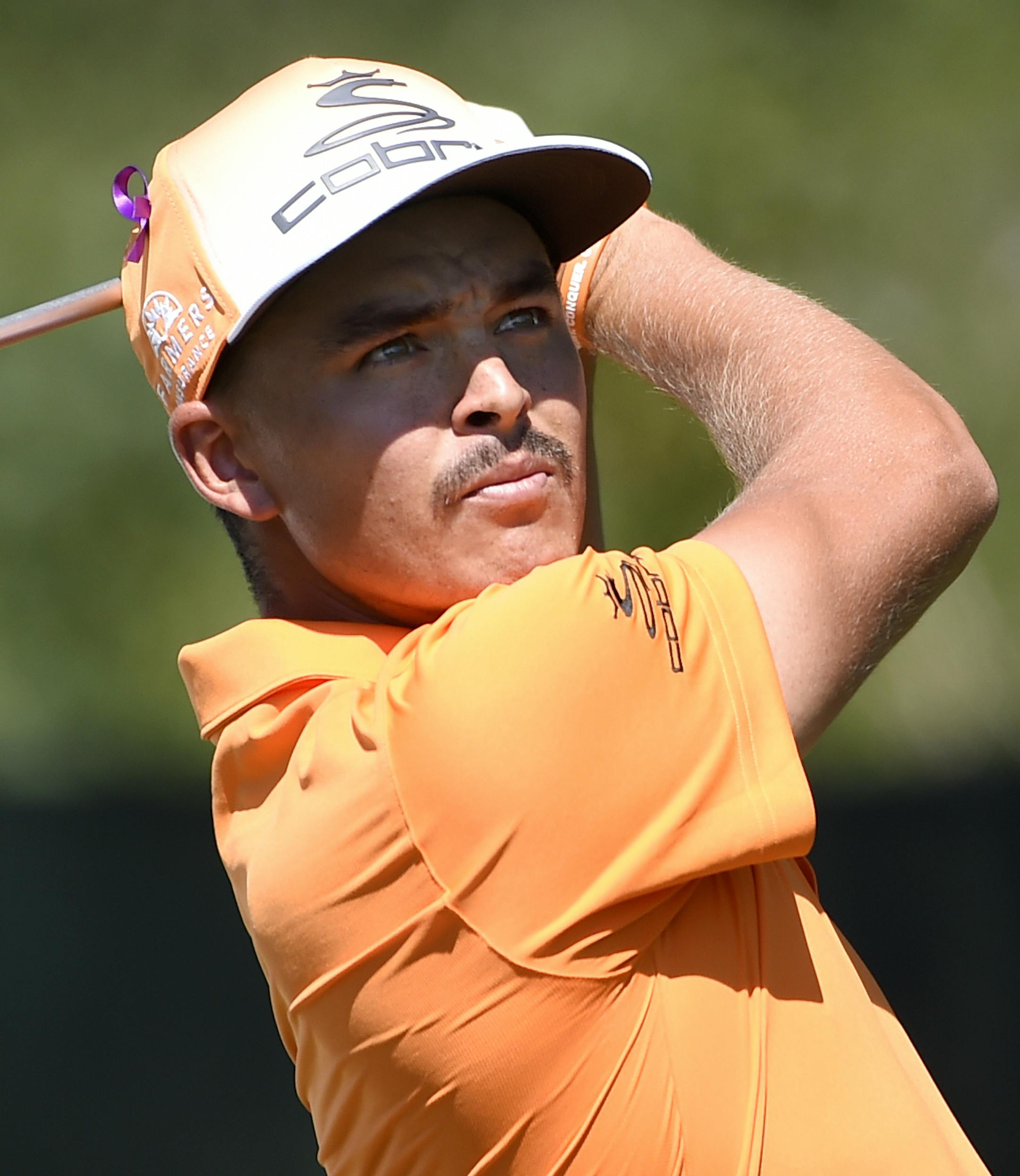 Rickie Fowler tees off from the third hole during the final round of The Barclays golf tournament in Farmingdale, N.Y., Sunday, Aug. 28, 2016. (AP Photo/Kathy Kmonicek) ORG XMIT: NYKK110