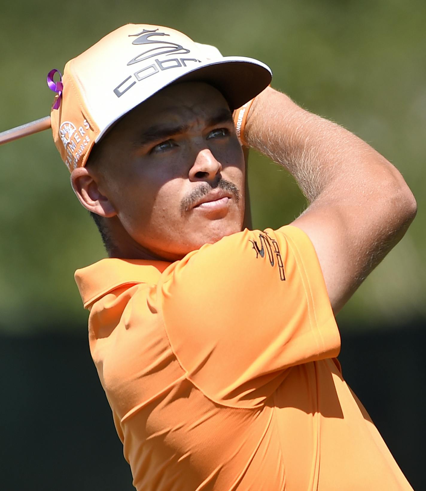 Rickie Fowler tees off from the third hole during the final round of The Barclays golf tournament in Farmingdale, N.Y., Sunday, Aug. 28, 2016. (AP Photo/Kathy Kmonicek) ORG XMIT: NYKK110