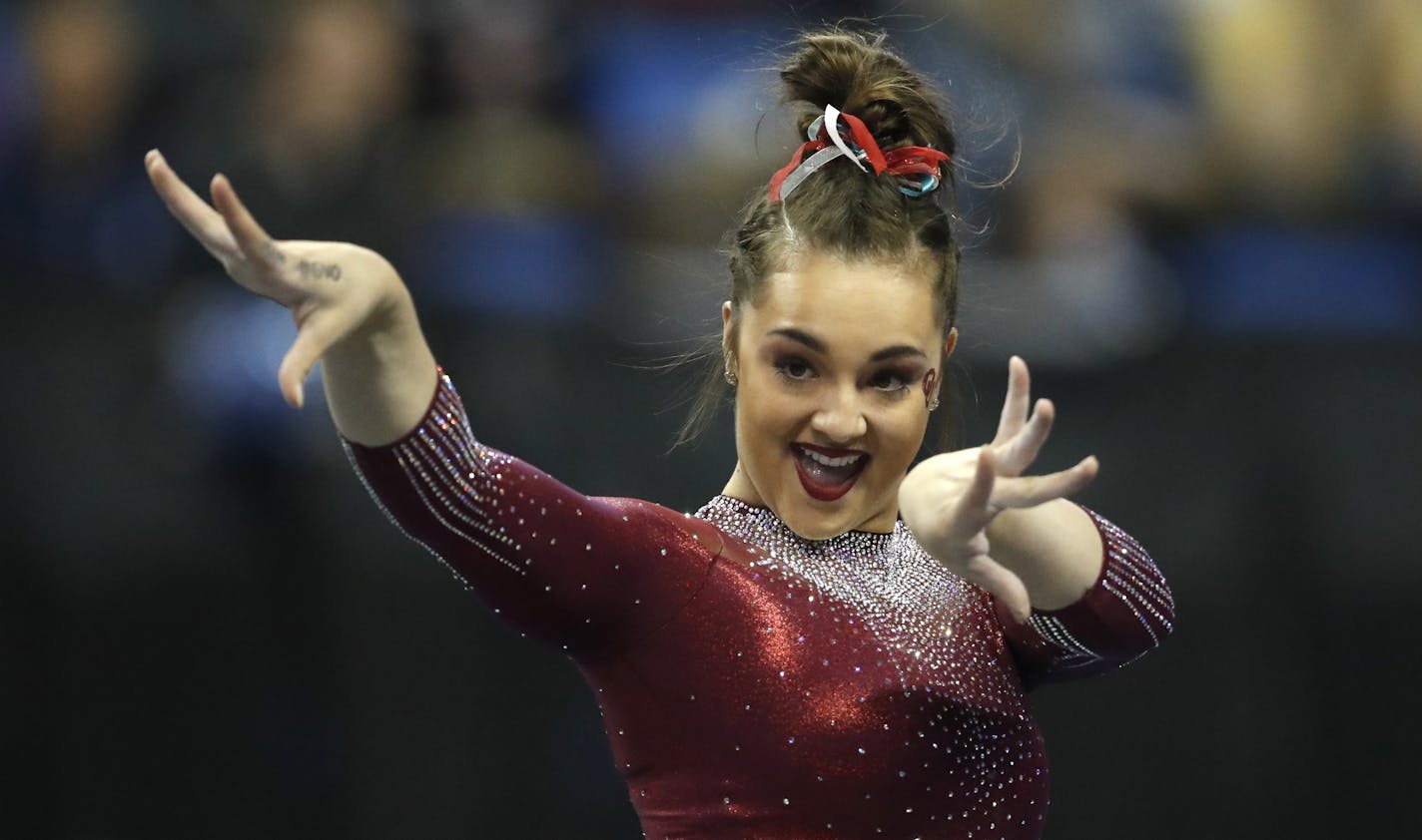 Oklahoma's Maggie Nichols competes in the floor exercise during the NCAA college women's gymnastics championships Saturday, April 21, 2018, in St. Louis. (AP Photo/Jeff Roberson) ORG XMIT: MOJR221