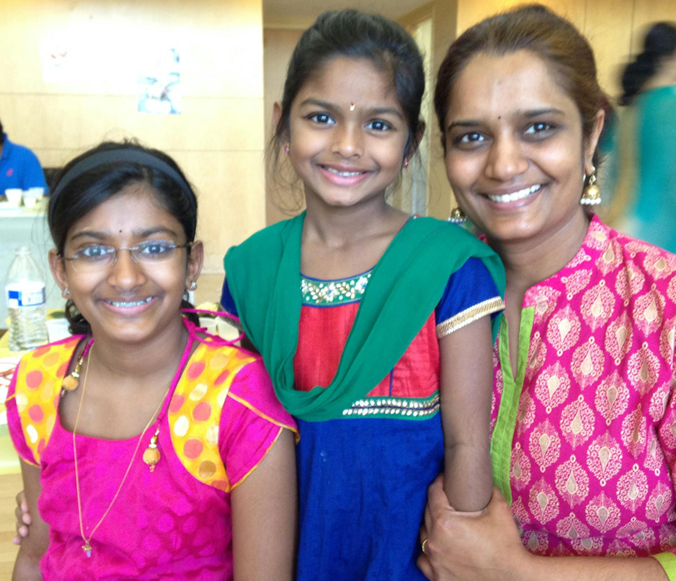 Priya Mani with (girl with glasses) Thabash Mani and the other one is Nitika Bala Credit: Lee Svitak Dean