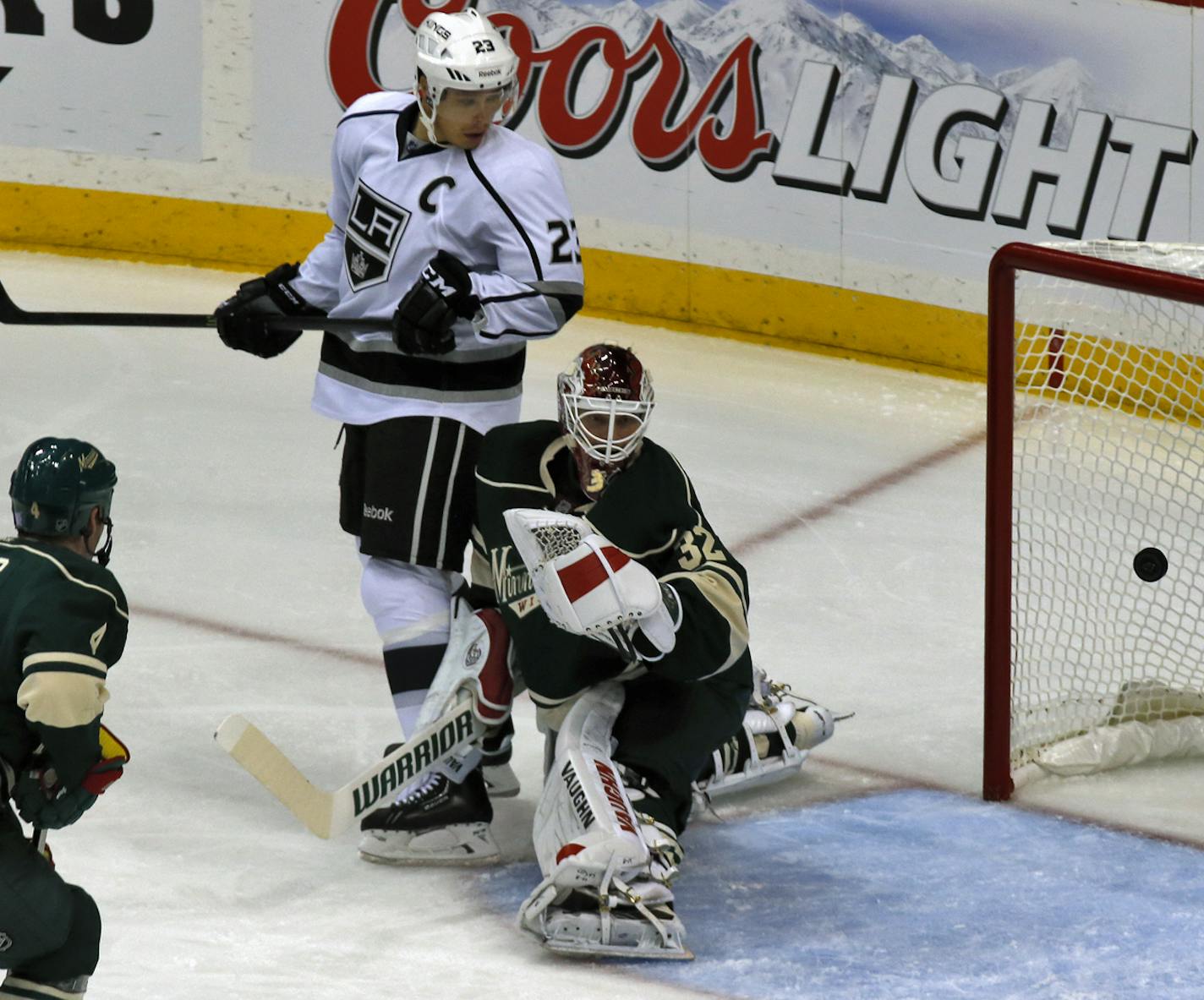 Dustin Brown and Wild goalie Niklas Backstrom watched the puck fly into the net as the Kings scored in first period action.