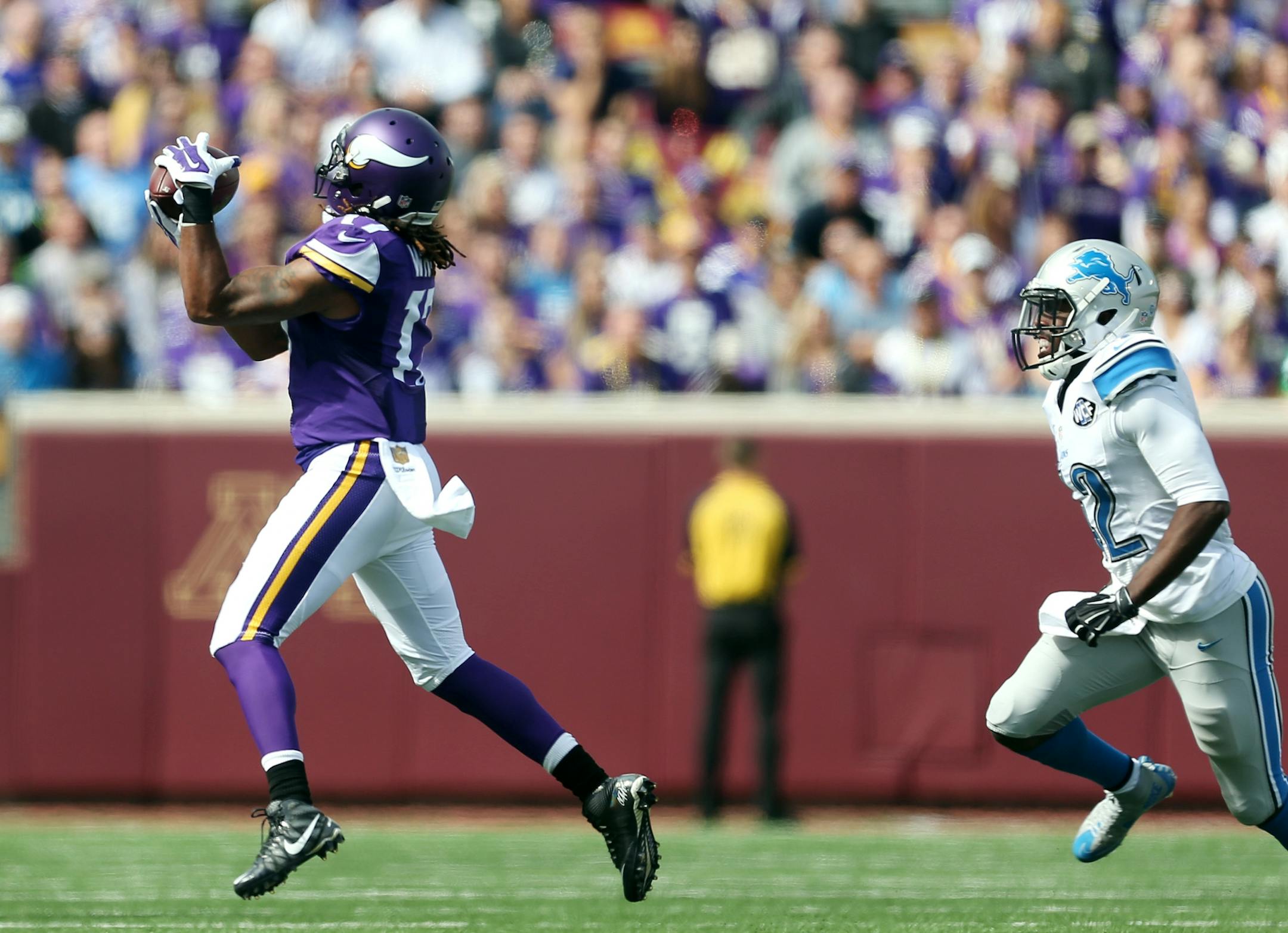Minnesota Vikings wide receiver Jarius Wright (17) pulled a first down catch in the first quarter over Detroit Lions strong safety Isa Abdul-Quddus (42) at TCF Bank Stadium Sunday September 20, 2015 in Minneapolis , MN.