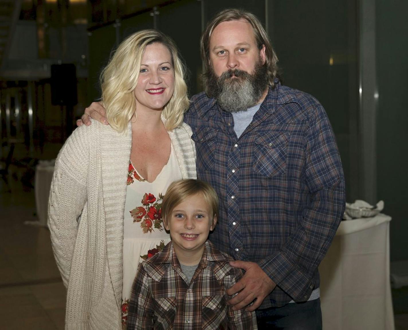 Matt and Maddy Logelin and Lizzie Molyneux at the downtown Minneapolis Central Library for a fundraiser for the Liz Logelin Foundation.