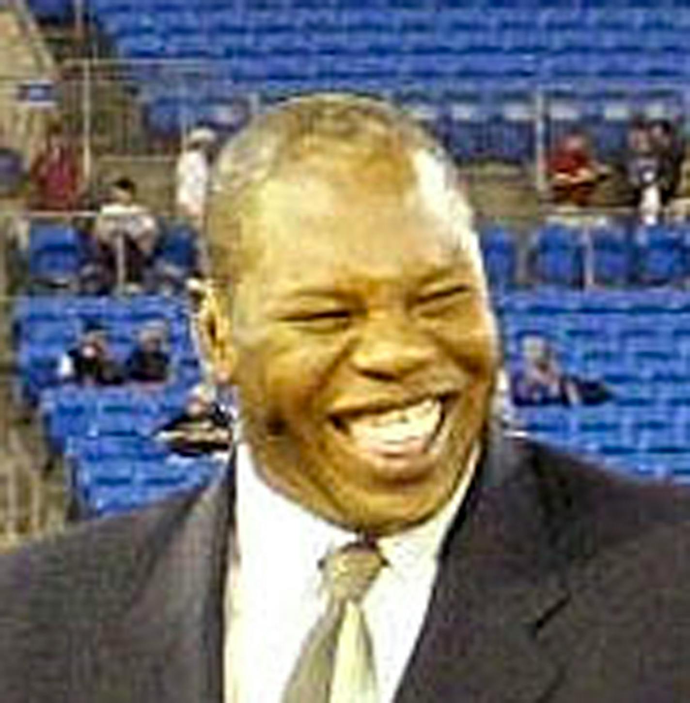 ESPN anchors, from left, Tom Jackson, Michael Irvin, and Ron Jaworski, joke during ther broadcast from the field before the start of the Carolina Panthers' season opener aganist the Green Bay Packers on Monday Night Football in Charlotte, N.C., Monday Sept. 13, 2004. (AP Photo/Chuck Burton)