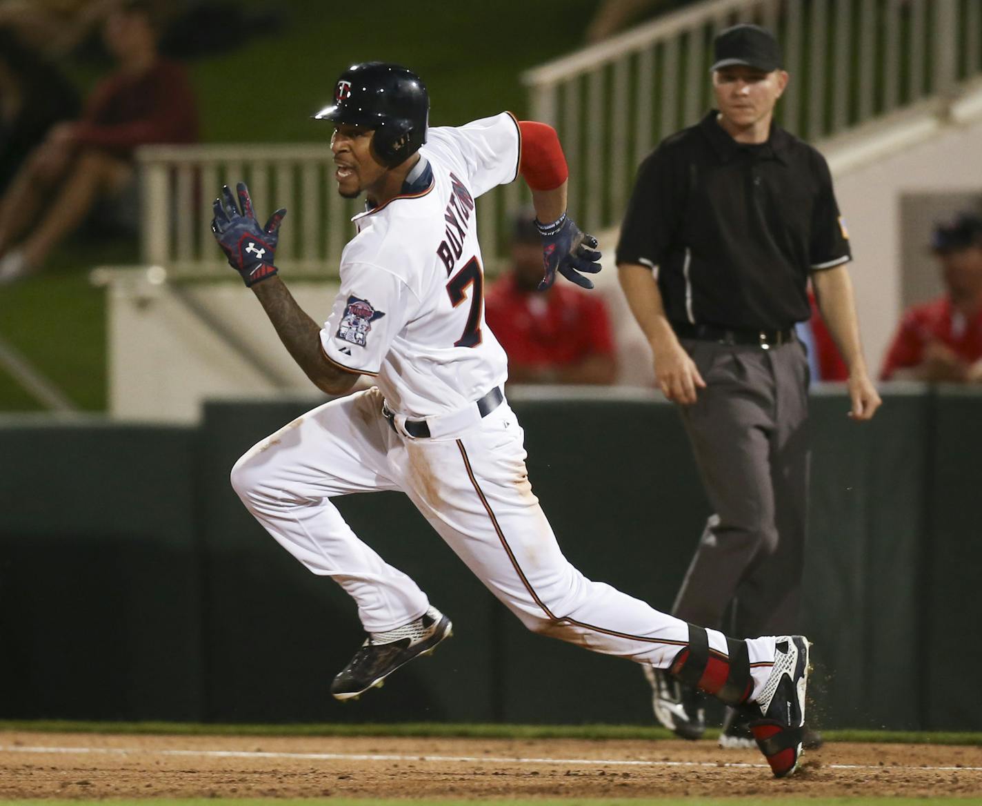 Minnesota Twins center fielder Byron Buxton sprinted to second after his second double of the game Wednesday night at Hammond Stadium. ] JEFF WHEELER &#xef; jeff.wheeler@startribune.com The Twins played their first exhibition game against the University of Minnesota baseball team Wednesday night, March 4, 2015, at Hammond Stadium in Fort Myers, FL. ORG XMIT: MIN1503061222570726