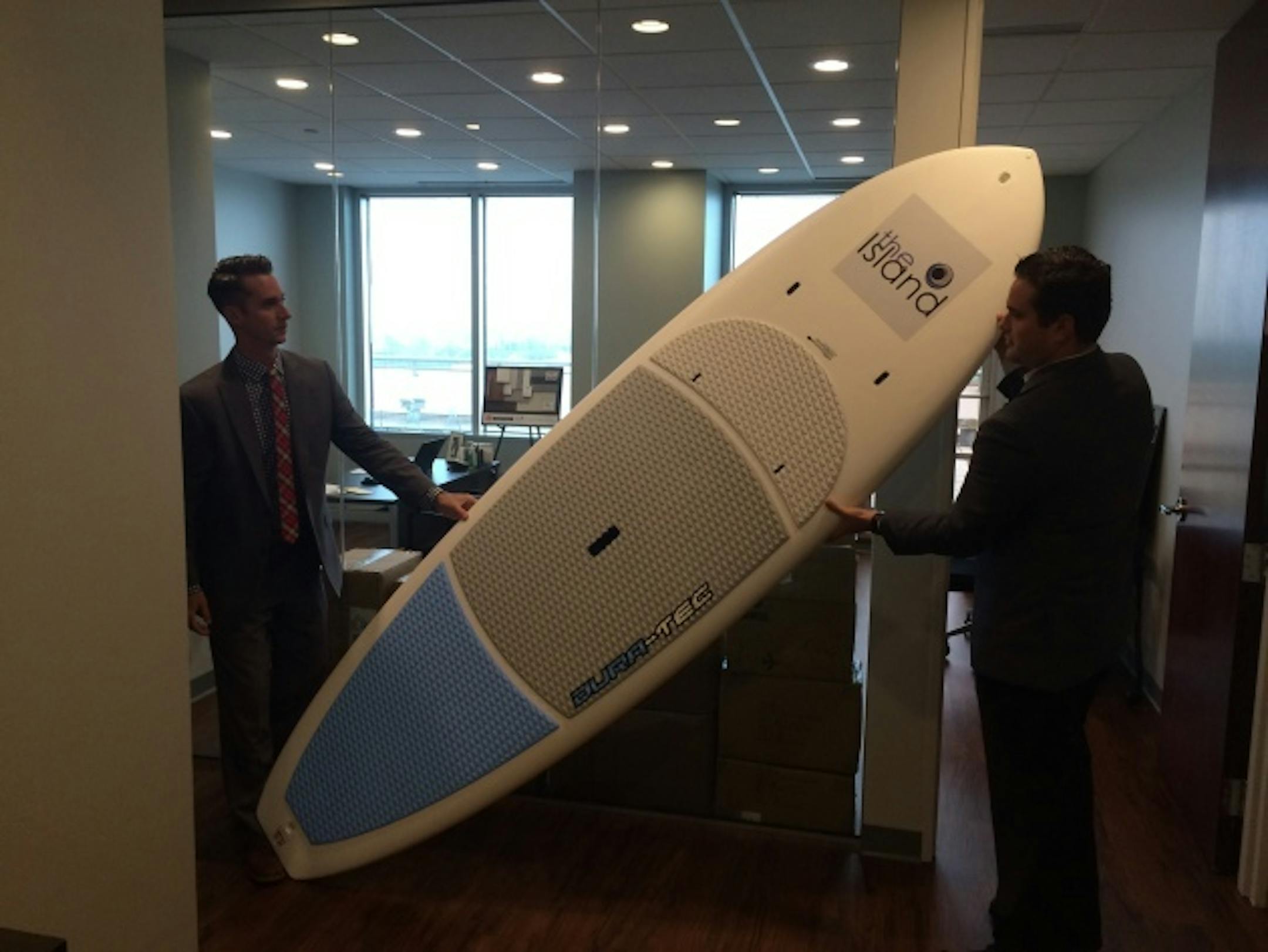 A stand-up paddle board is one of the unique amenities at the Island Residences.