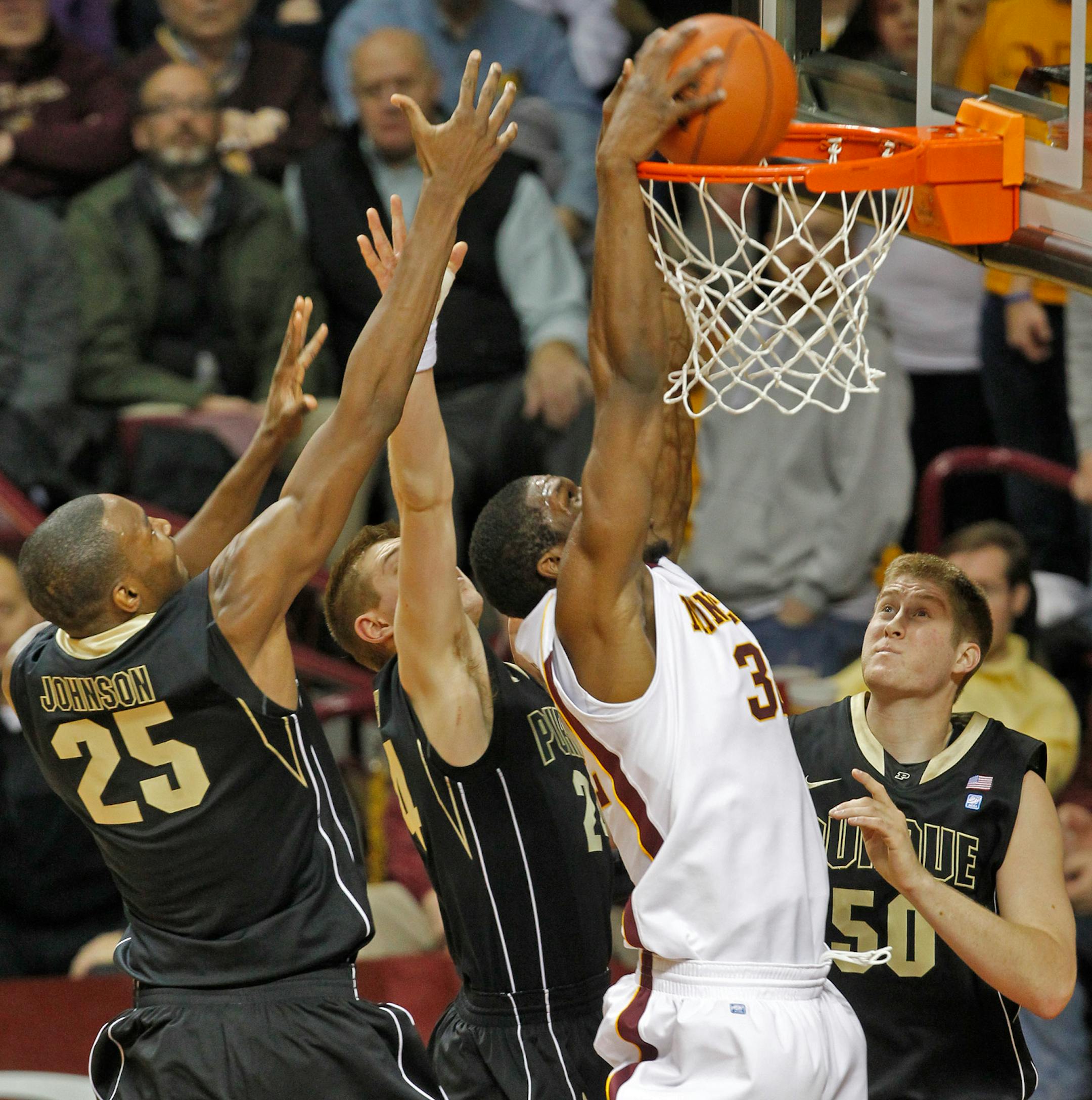 Gophers forward Trevor Mbakwe broke through the Purdue defense for a first-half dunk Thursday night.