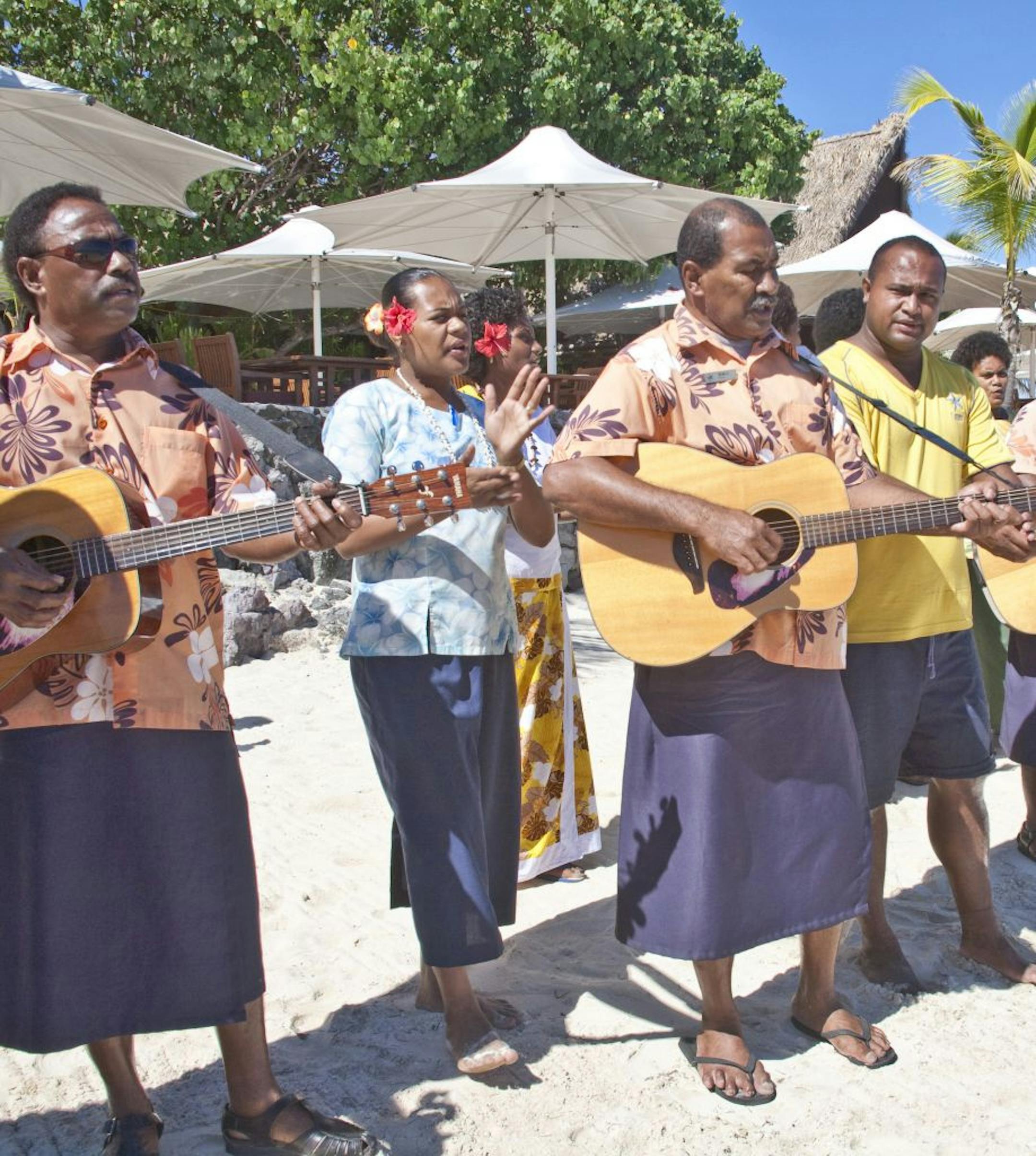The staff sang as visitors arrived at Castaway Resort. Even pre-planned welcomes convey a genuine warmth.