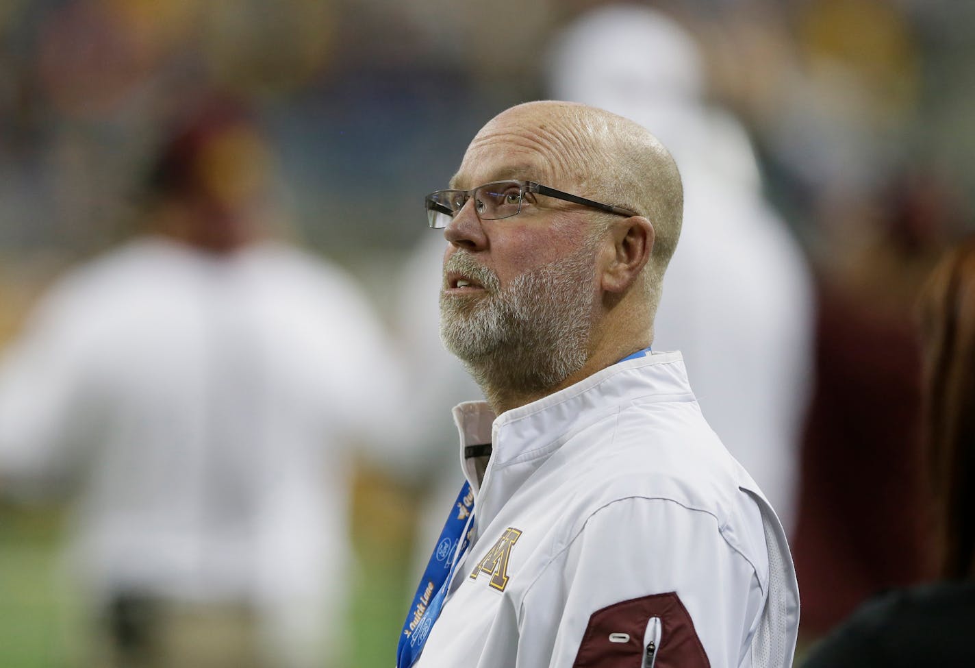 Former Minnesota head football coach Jerry Kill watches from the sidelines during the first half of the Quick Lane Bowl NCAA college football game against Central Michigan, Monday, Dec. 28, 2015, in Detroit. (AP Photo/Carlos Osorio)