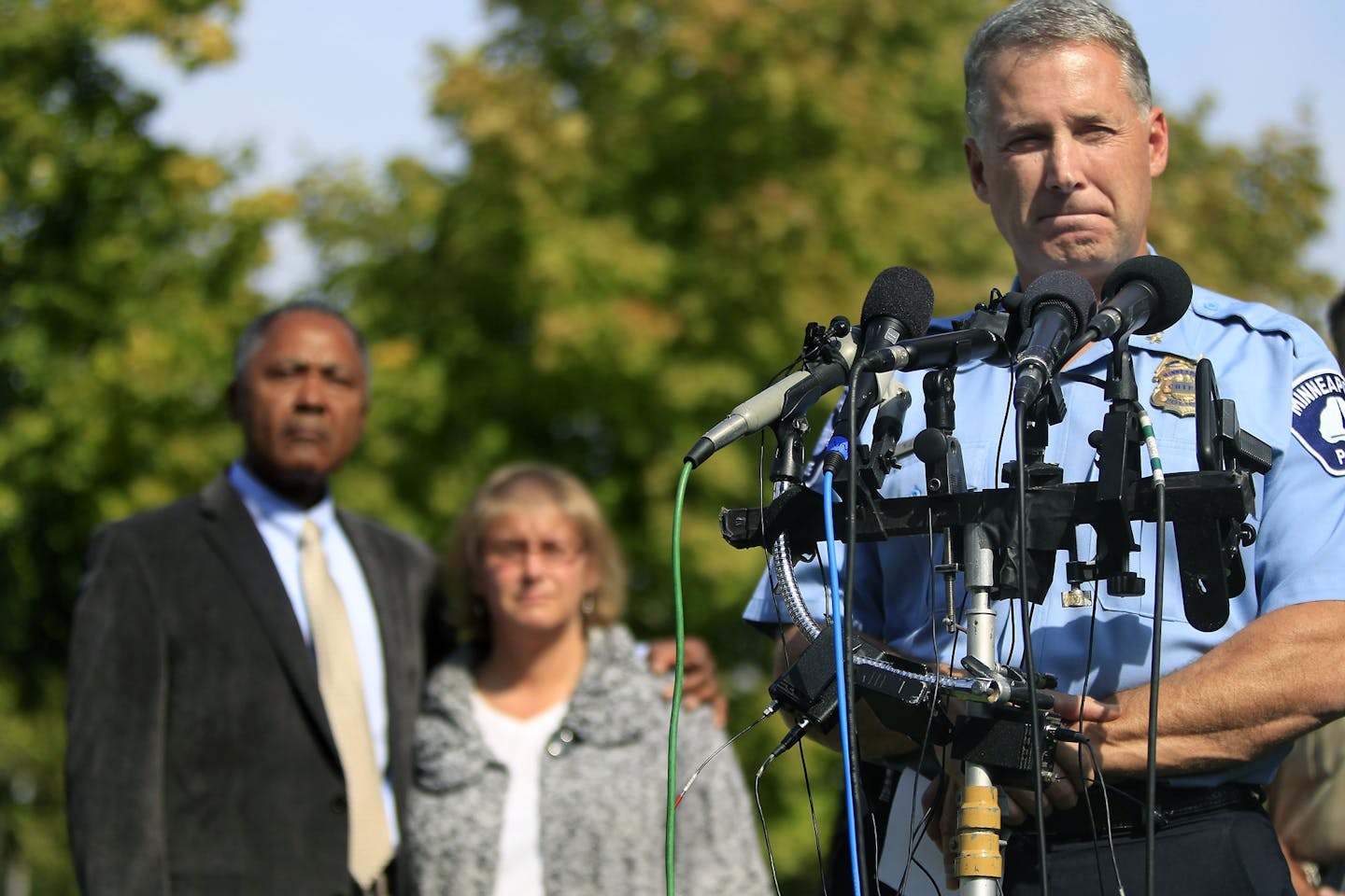 Minneapolis Police Chief Tim Dolan briefed the press about Thursday's shootings during a press conference at the Bryn Mawr Presbyterian Church, Friday, September 28, 2012. Dolan was joined by city leaders including, Council Members Don Samuels, left, and Lisa Goodman. (ELIZABETH FLORES/STAR TRIBUNE) ELIZABETH FLORES � eflores@startribune.com