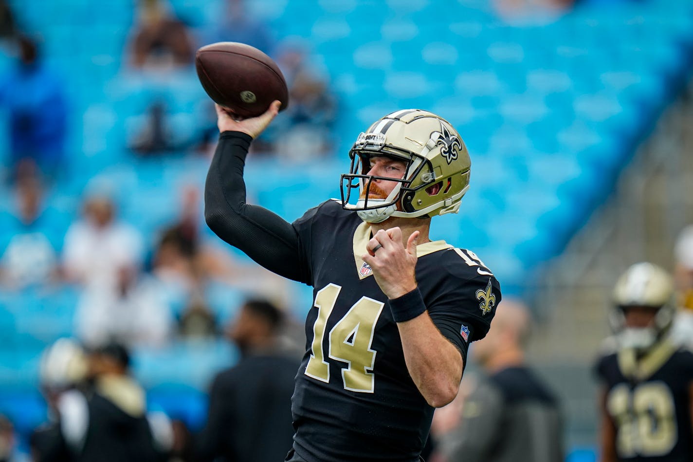 New Orleans Saints quarterback Andy Dalton (14) warms up prior to an NFL football game against the Carolina Panthers on Sunday, Sep. 25, 2022, in Charlotte, N.C. (AP Photo/Rusty Jones)