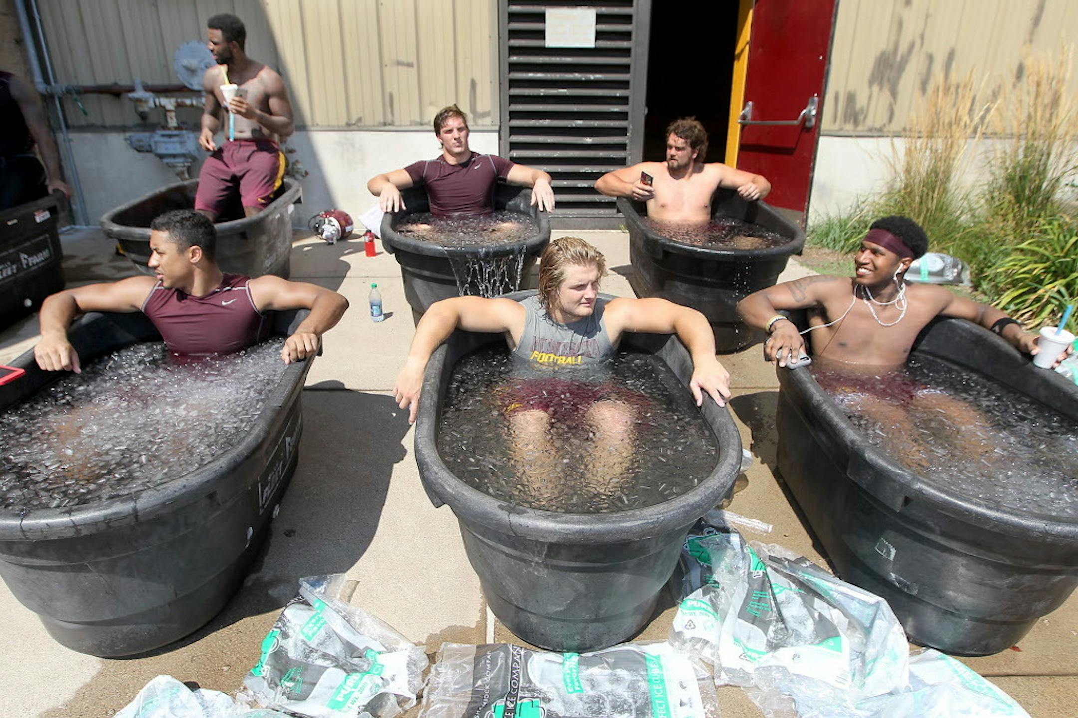 After practice Friday, some University of Minnesota players found some relief from the day's heat in some ice baths.