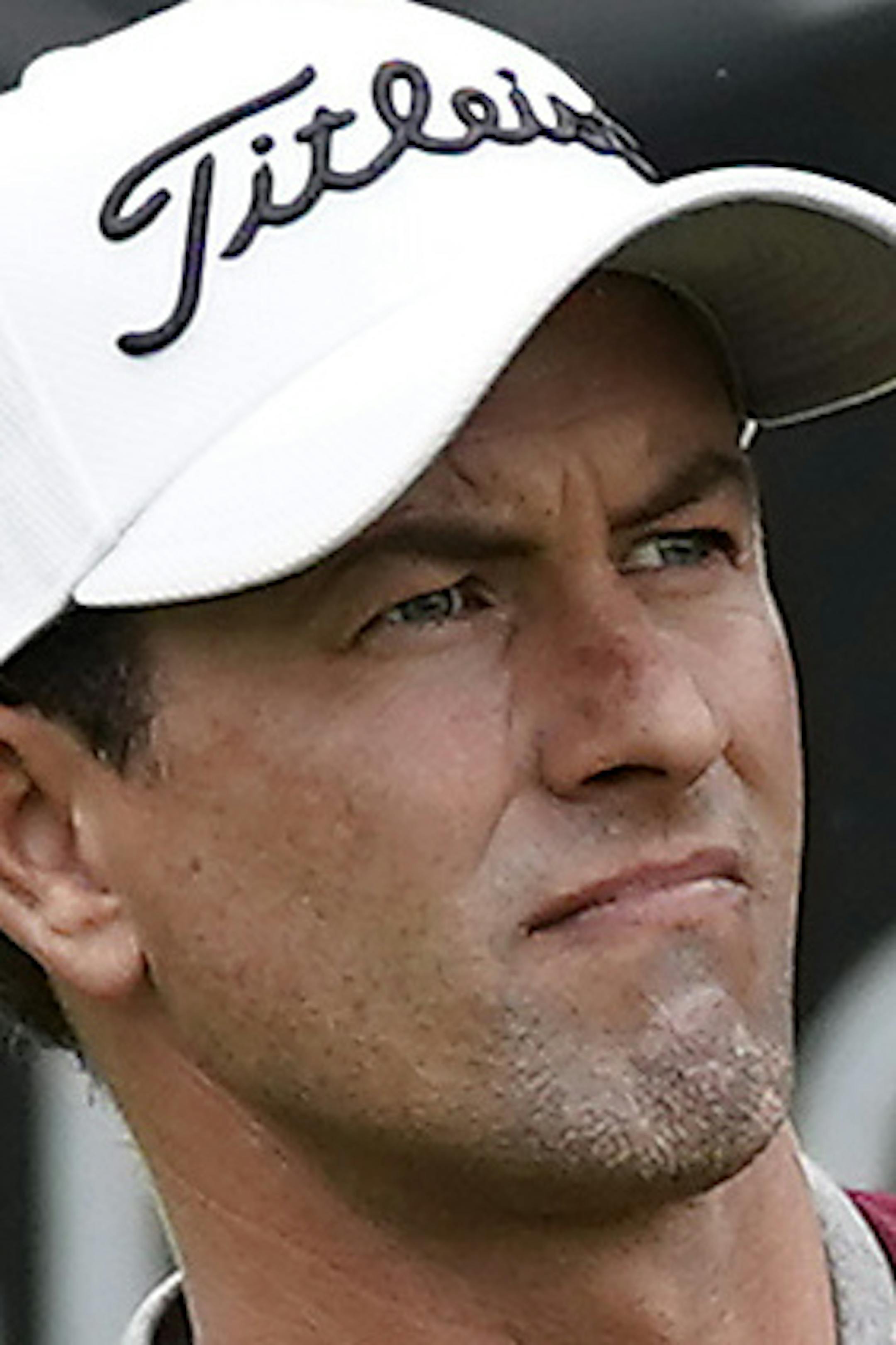 Adam Scott, of Australia, watches his chip onto the 17th green as first round play continues during the Genesis Open golf tournament at Riviera Country Club on Friday, Feb. 15, 2019, in the Pacific Palisades area of Los Angeles. (AP Photo/Ryan Kang)