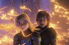 This image released by Universal Pictures shows characters Astrid, voiced by America Ferrera, left, and Hiccup, voiced by Jay Baruchel, in a scene fro