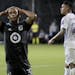 Minnesota United midfielder Hassani Dotson reacts after missing a shot on goal against Orlando City during the second half of an MLS soccer match, Thu