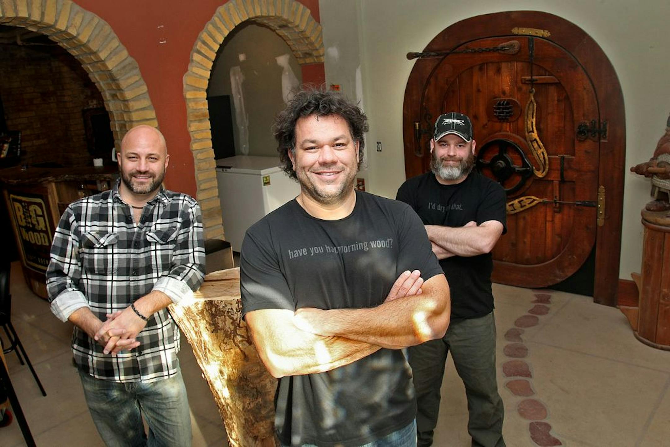 Big Wood Brewery founder Steve Merila, center, along with business partner Jason Medvec, left, and brewer Ty McBee, have a spring opening planned for a new brewery and taproom in downtown White Bear Lake.