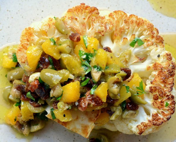 Cauliflower steaks can be topped with everything from an olive pistou to marinara sauce and mozzarella cheese.