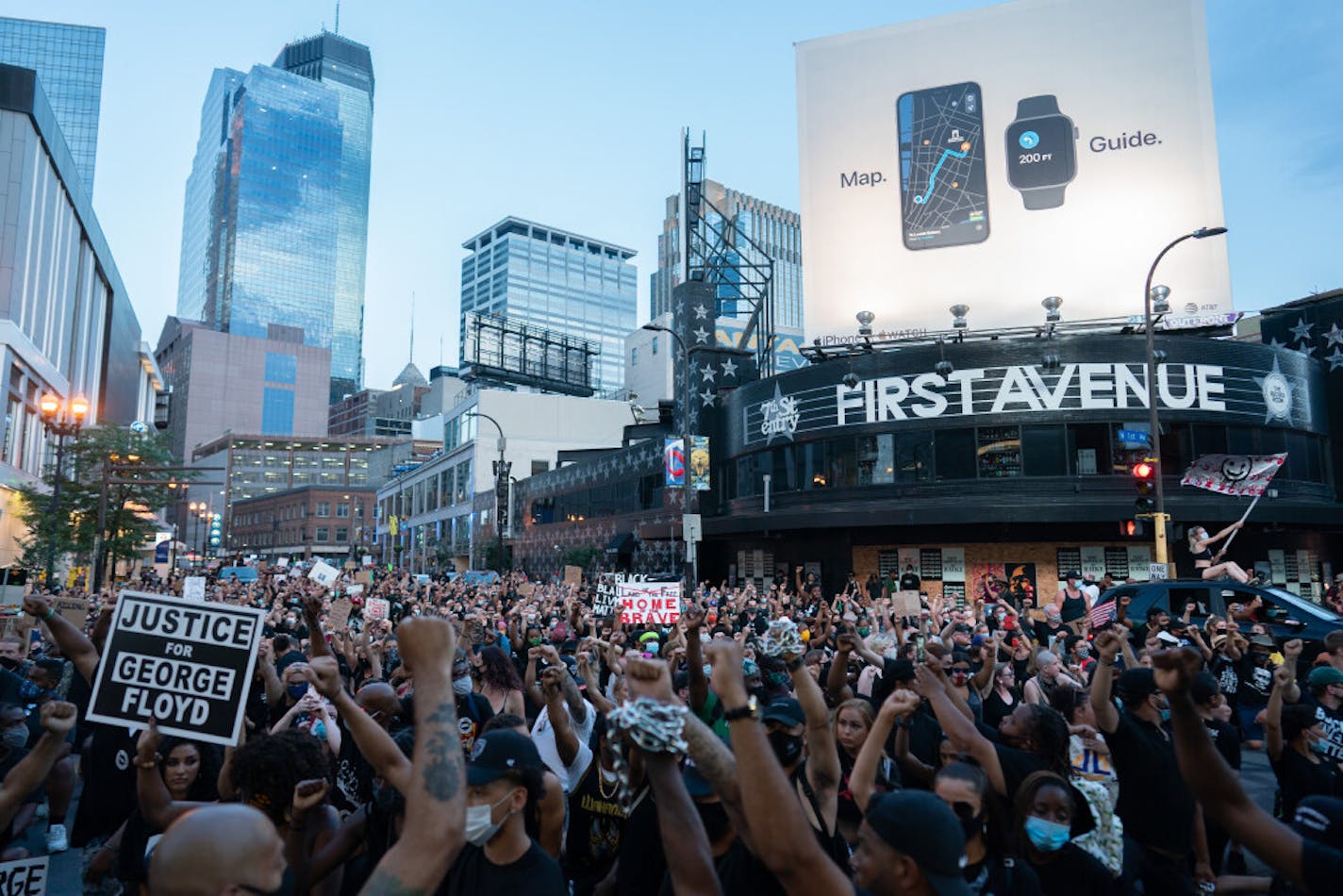 Hundreds of people dressed in black marched in solemn silence through downtown Minneapolis on Saturday night to call for racial justice and an end to police killings of Black Americans.