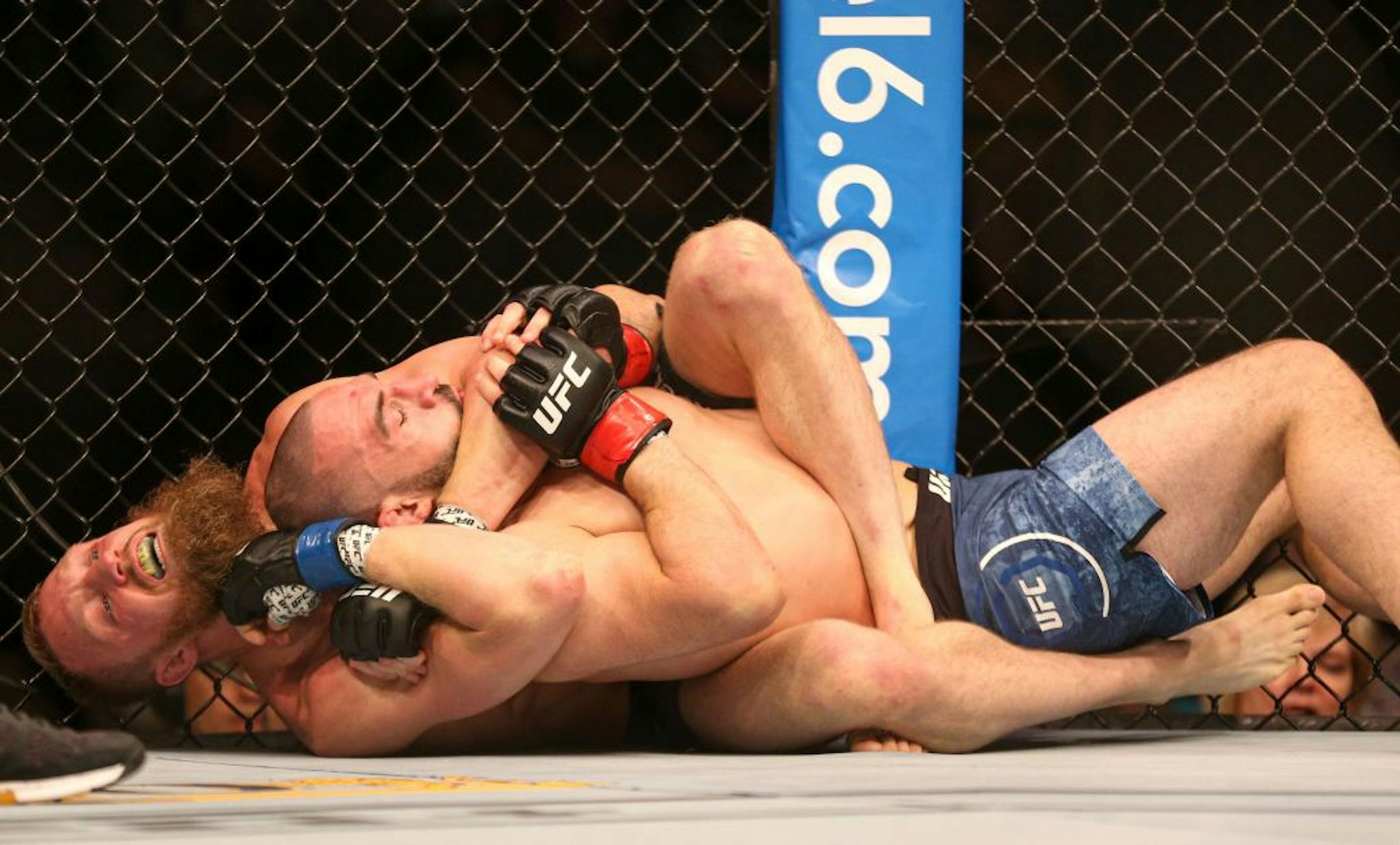 Jarde Gordon is subdued by Dan Moret on the floor. Gordon would go on to win the match by unanimous decision. ALEX KORMANN ¥ alex.kormann@startribune.com UFC Fight Night was held at Target Center on Saturday June 29, 2019. Francis Ngannou and Junior Dos Santos headlined the event.