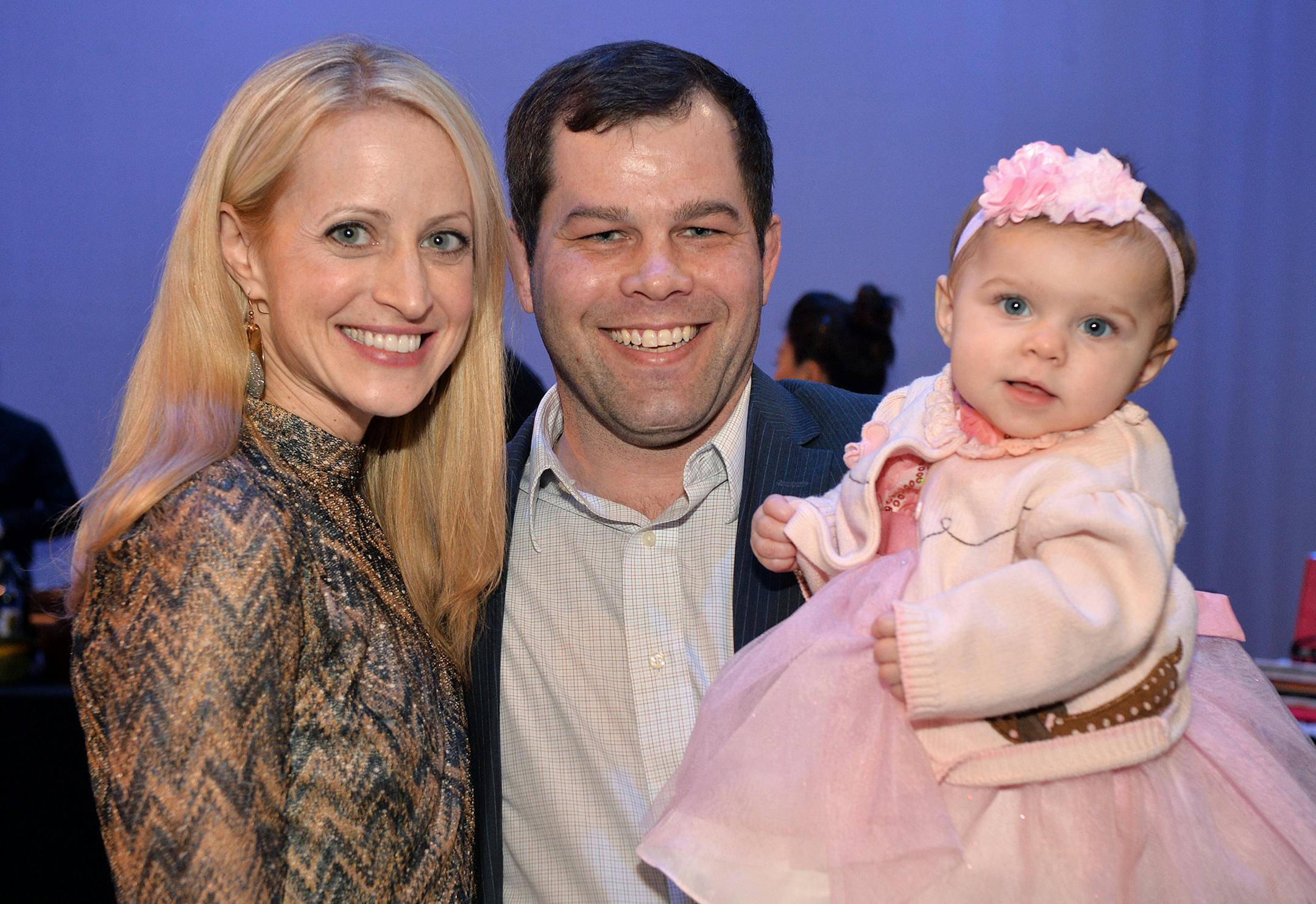 Collide founder and artistic director Regina Peluso and her husband, Jason Halupnick, and their daughter, Philemena.
