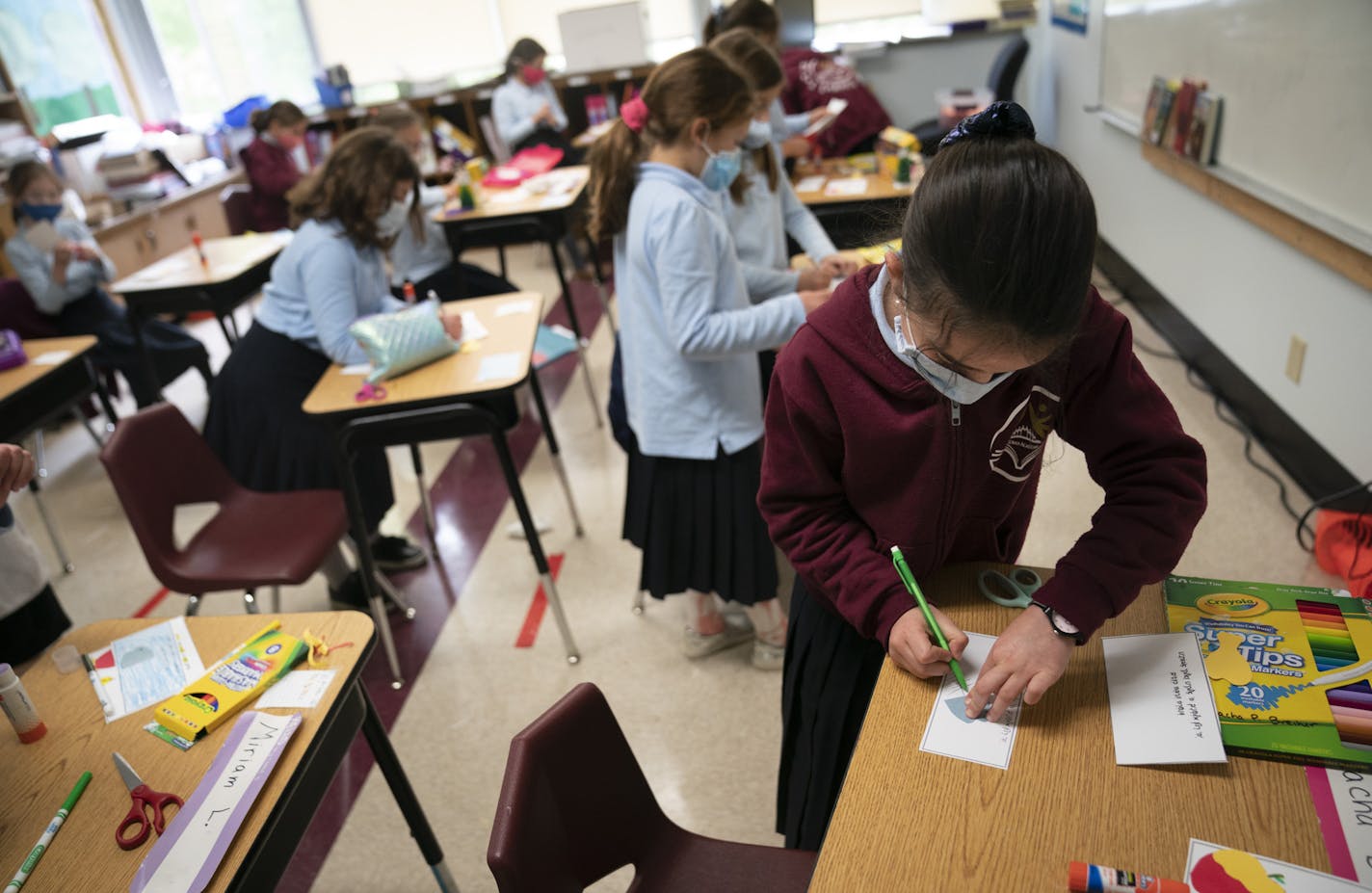 Fourth grade girls in teacher Nechama Idstein's class made prayer cards with cut outs of traditional foods for Yom Kippur meals during class at Torah Academy in St. Louis Park, Minn., on Thursday, September 17, 2020. ] RENEE JONES SCHNEIDER renee.jones@startribune.com They didn't want me to use names.