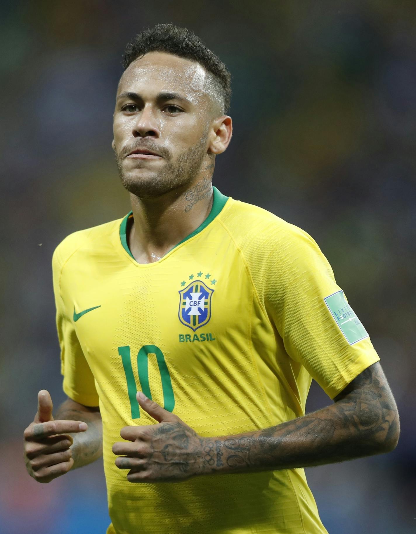 Brazil's Neymar runs during the quarterfinal match between Brazil and Belgium at the 2018 soccer World Cup in the Kazan Arena, in Kazan, Russia, Friday, July 6, 2018. (AP Photo/Frank Augstein)