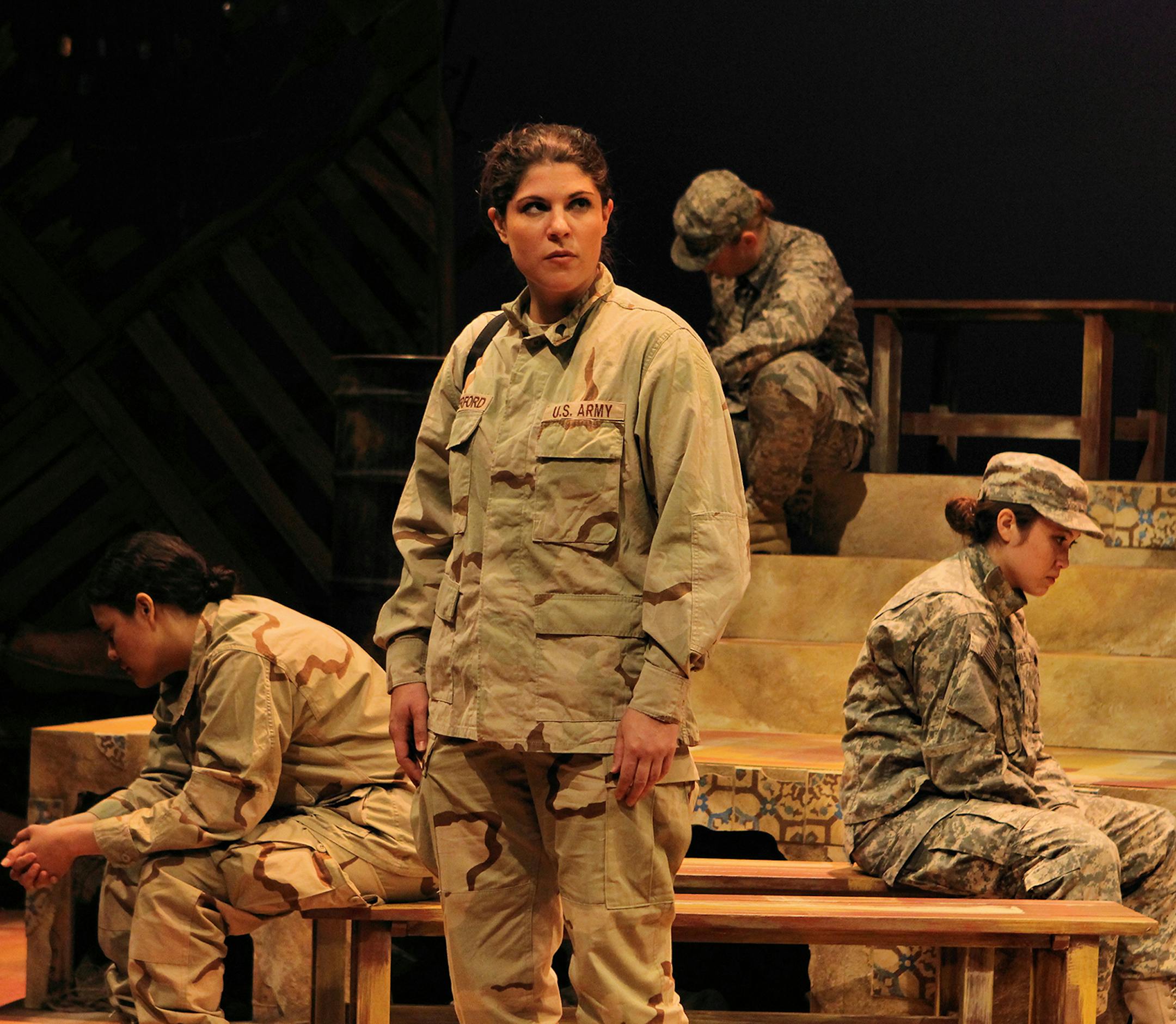 Soldier Anna Peterford (Shana Berg) describes arriving in Iraq for the first time in "Lonely Soldiers: Women at War in Iraq" at History Theatre. Photo by Scott Pakudaitis. March 16-April 6, 2014
