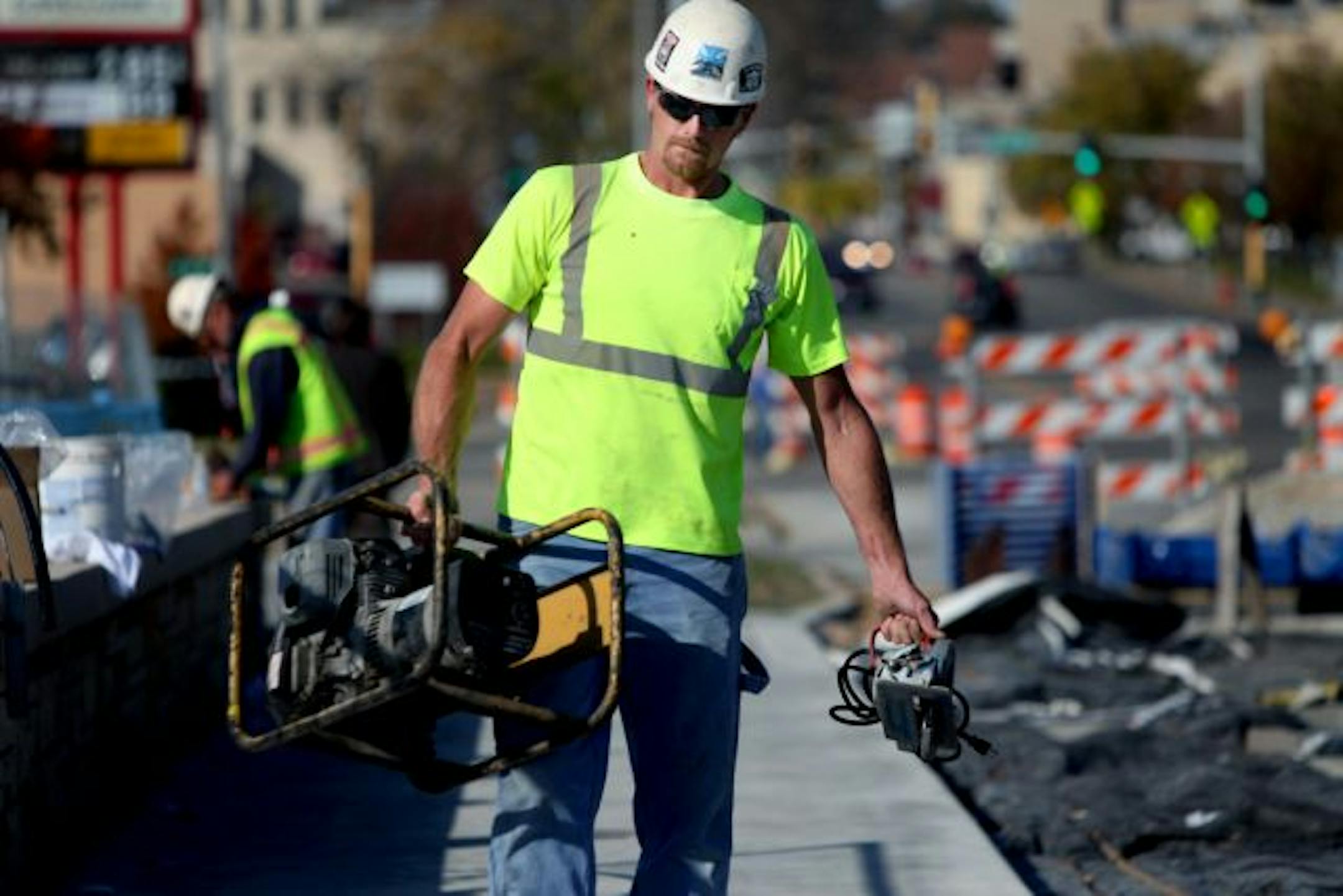 Mike Meyer, 34, of Dodge City, MN, made his way through a work site near downtown Rochester. Meyer, a carpenter, said that he would not be employed had it not been for the 2009 Recovery Act Stimulus Package.