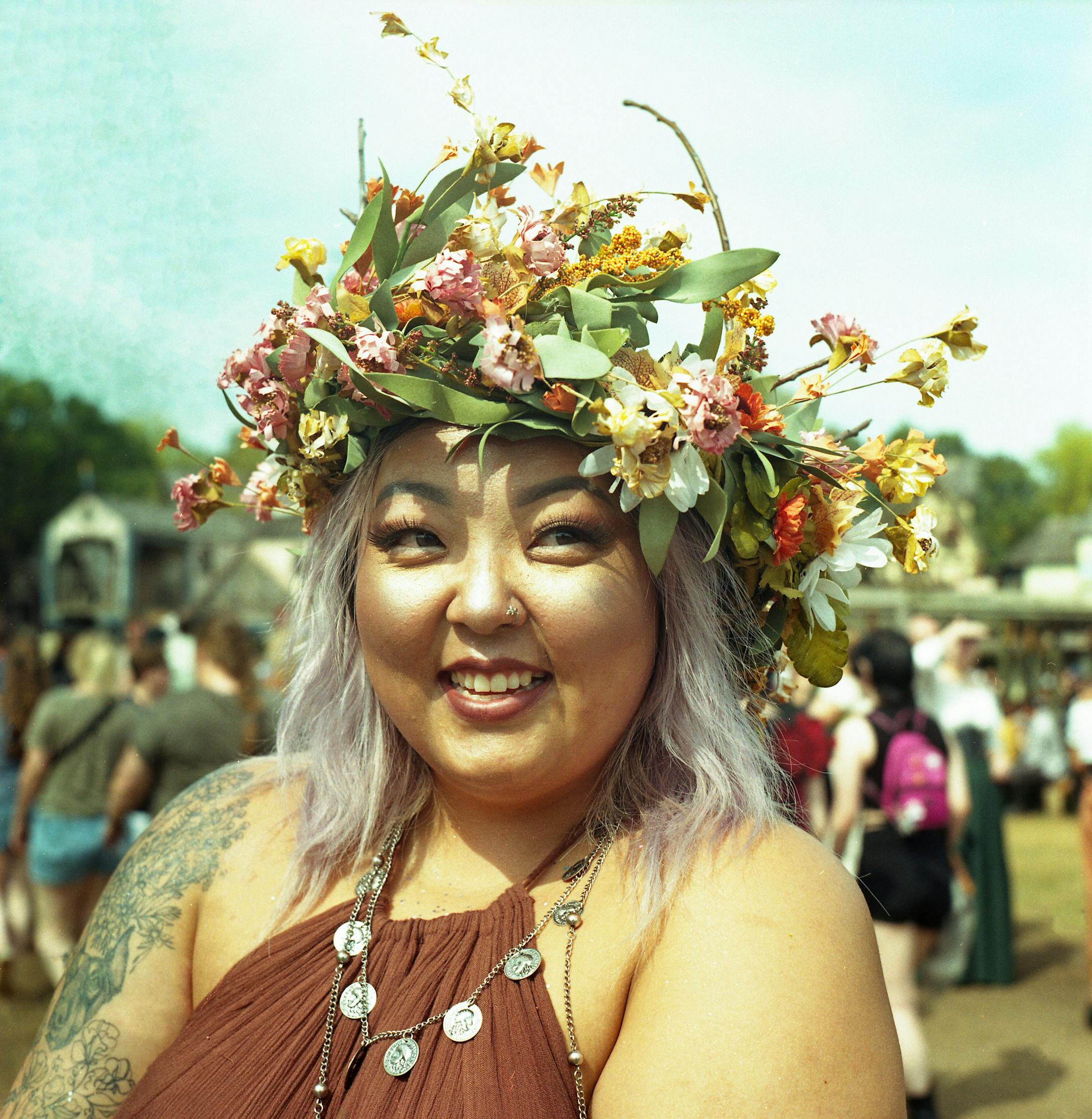 Abby Thao with her handmade crown of flowers. "I cosplay everywhere, not just at the Renaissance Festival, but this is just a place I don't feel judged," she said.