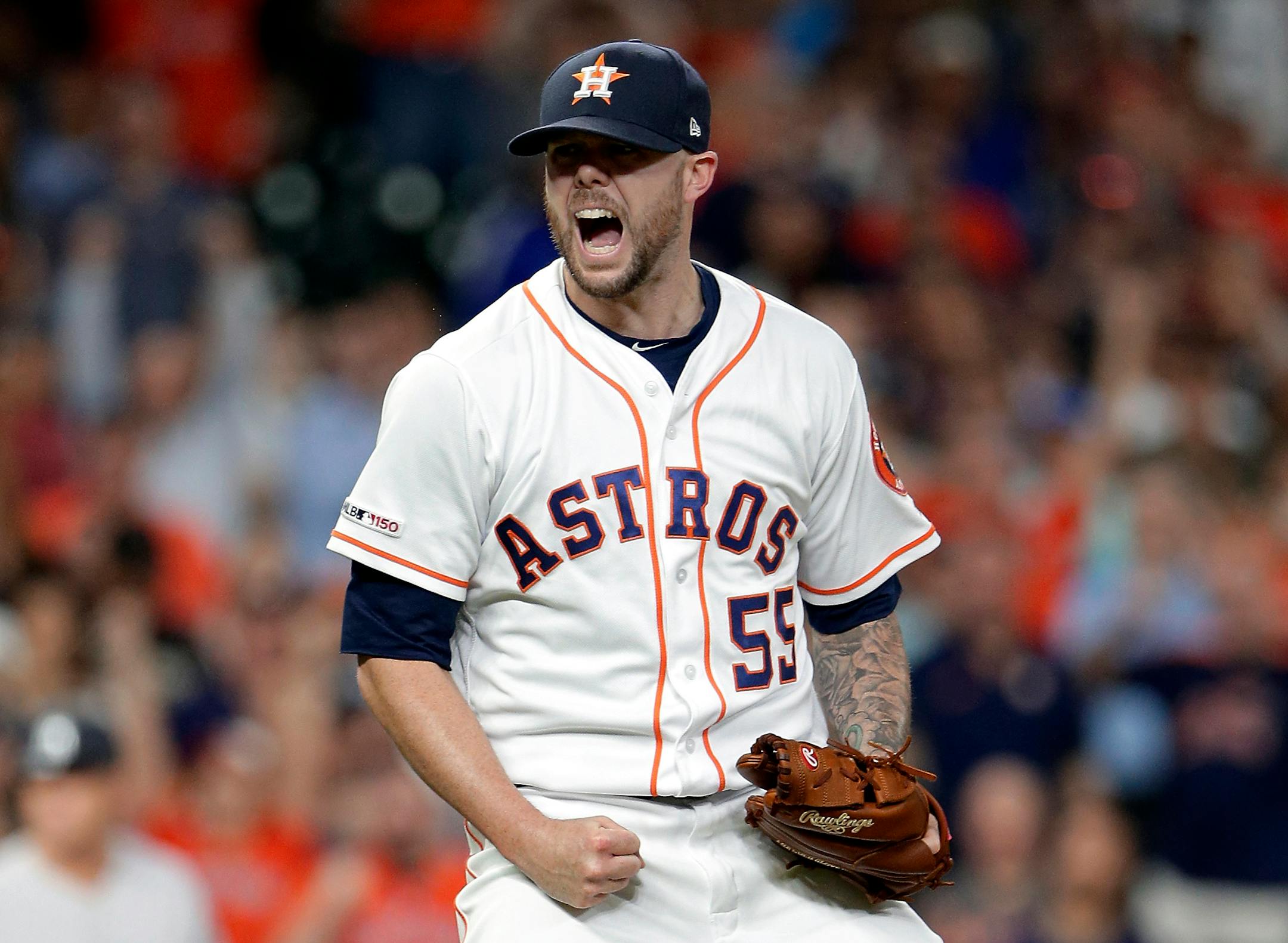 Houston Astros relief pitcher Ryan Pressly (55) reacts after striking out New York Yankees catcher Gary Sanchez to end the eighth inning of a baseball game after the New York Yankees scored four runs, Wednesday, April 10, 2019, in Houston. (AP Photo/Michael Wyke)