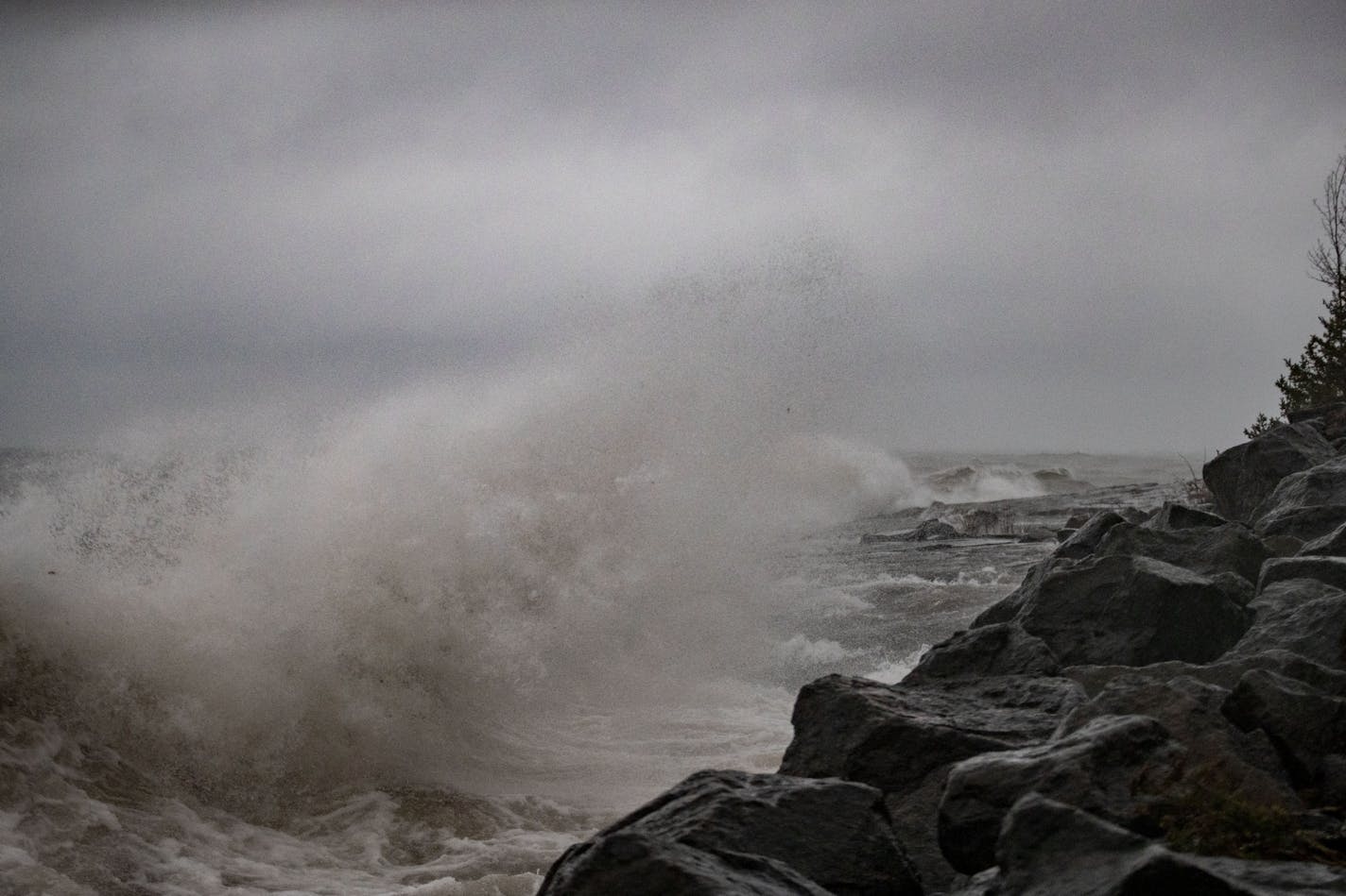 Massive waves bashed against the rocks on the coastline of Stony Point in northern Duluth.