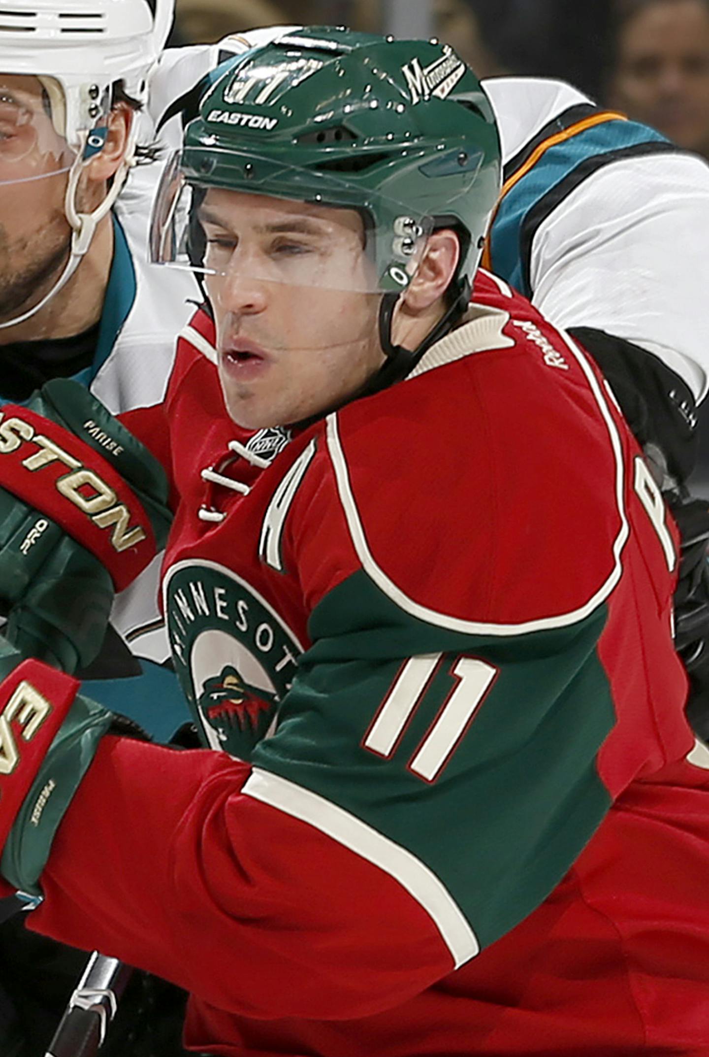 Brenden Dillon (4) and Zach Parise (11) fought for position in the second period. ] CARLOS GONZALEZ cgonzalez@startribune.com - April 5, 2016, St. Paul, MN, Xcel Energy Center, NHL, Hockey, Minnesota Wild vs. San Jose Sharks