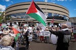 A group of protesters against the war in Gaza gathered outside the Duluth Convention Center on the second day of the DFL State Convention Saturday, Ju