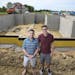 Ryan Cook and Trent Kasper are building a 4,000-square-foot home in Minnetrista. They say low interest rates make the project possible.