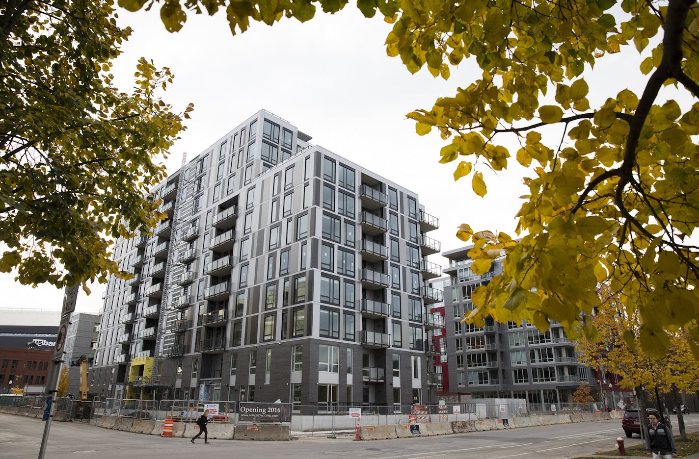 The Encore apartments, under construction in the Minneapolis Mill District, will add to the rental market in the Twin Cities, which is red-hot right now.