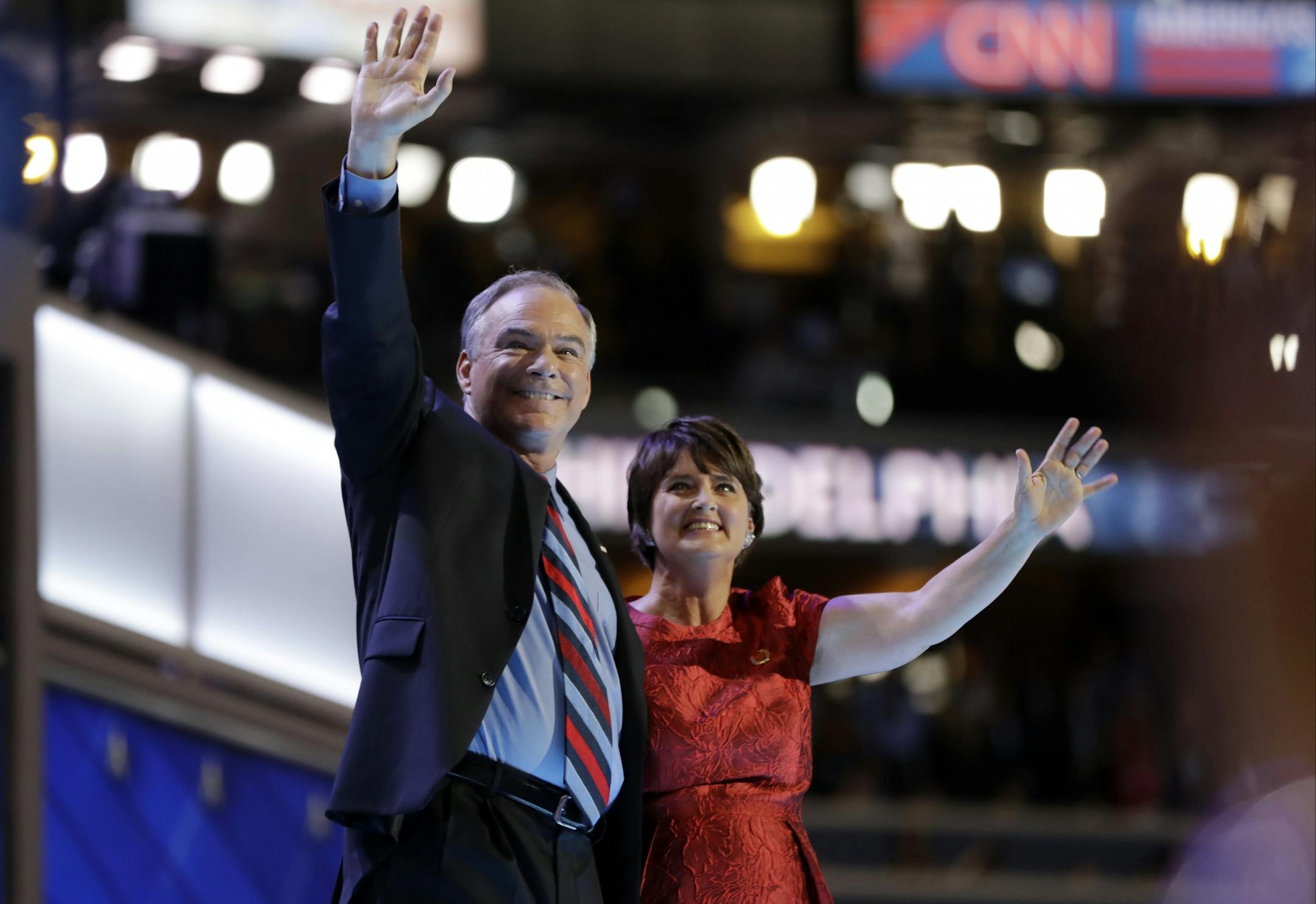 Democratic vice presidential candidate, Sen. Tim Kaine, D-Va., waves with his wife Anne Holton during the third day session of the Democratic National Convention in Philadelphia, Wednesday, July 27, 2016.