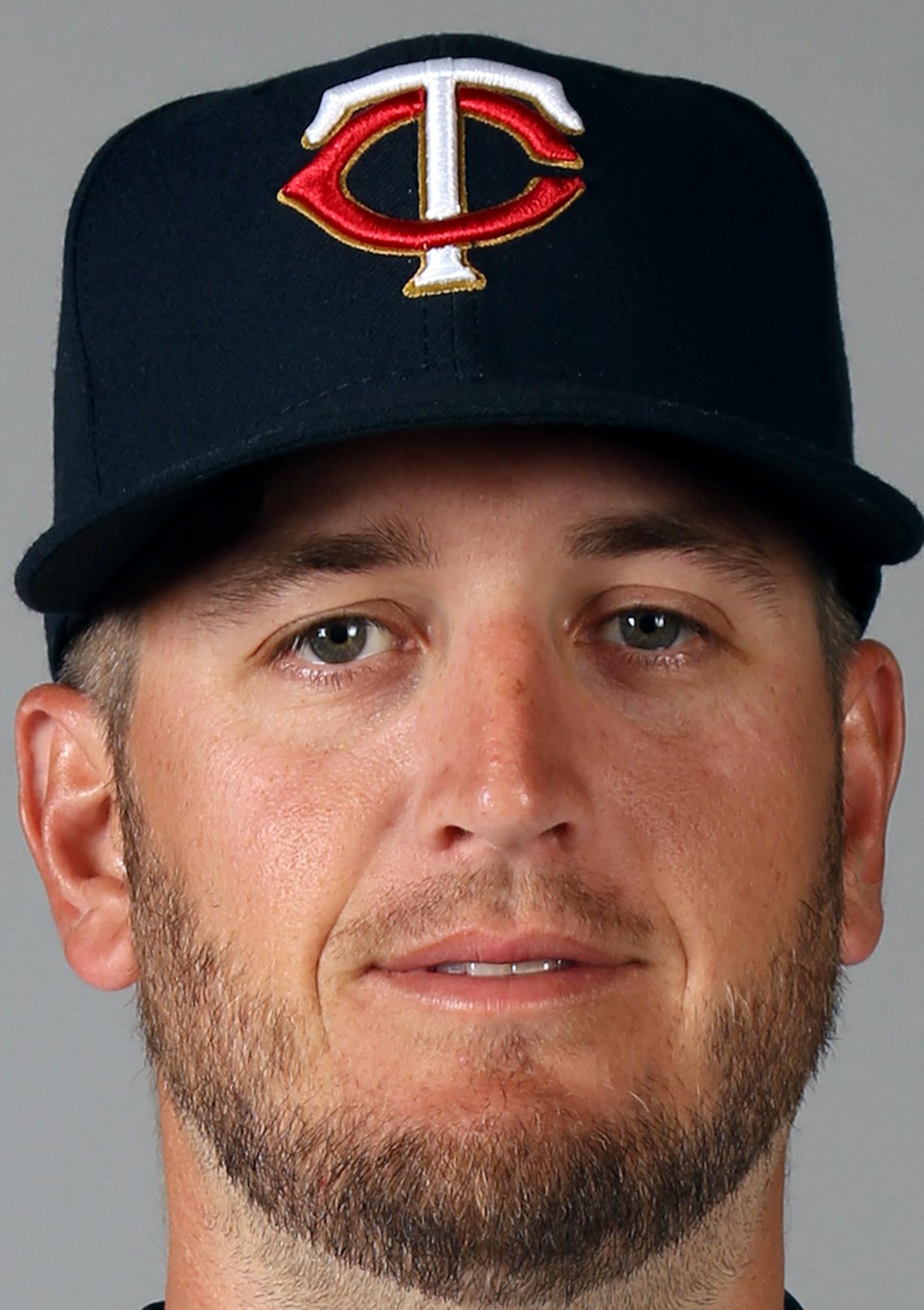 FORT MYERS, FL - MARCH 3: Glen Perkins #15 of the Minnesota Twins poses during Photo Day on Tuesday, March 3, 2015 at Hammond Stadium in Fort Myers, Florida. (Photo by Robbie Rogers/MLB Photos via Getty Images) *** Local Caption *** Glen Perkins ORG XMIT: 532475317