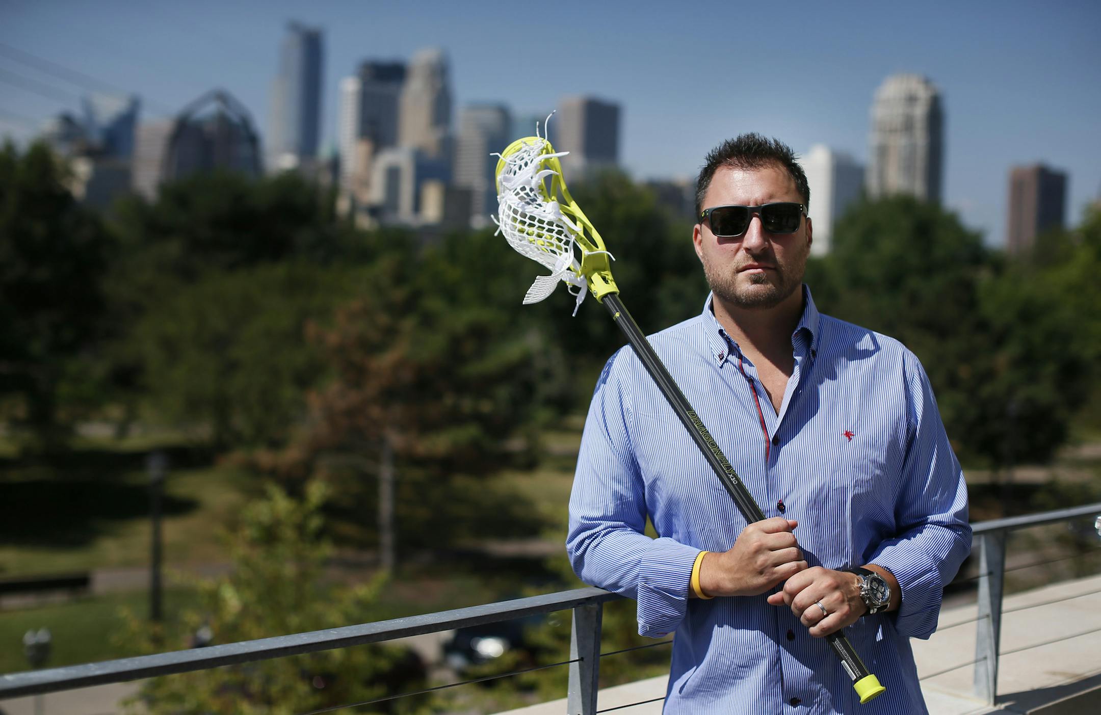 James Miceli posed with a Lacrosse stick Wednesday August 13 , 2014 in Minneapolis MN . Epoch, is making a splash in the lacrosse equipment market with a brand focused on technology. They are utilizing new designs and new materials to compete with established brands in one of North America's fastest growing sports ] Jerry Holt Jerry.holt@startribune.com