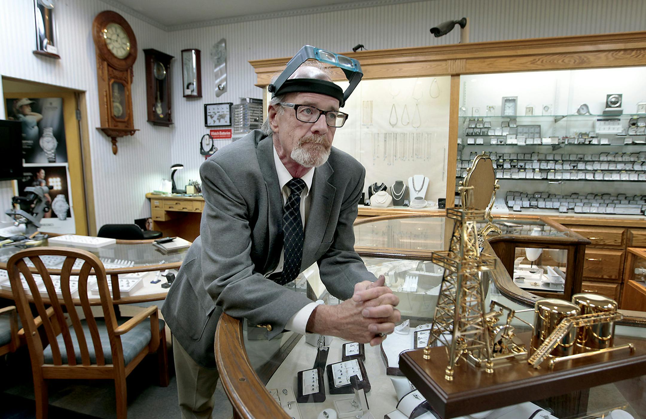of Ritter Brothers Diamond Cutters stood next to a cold-plated oil rig decoration at his jewelry store in downtown Williston, ND, Thursday, July 24, 2014. ] (ELIZABETH FLORES/STAR TRIBUNE) ELIZABETH FLORES ‚Ä¢ eflores@startribune.com