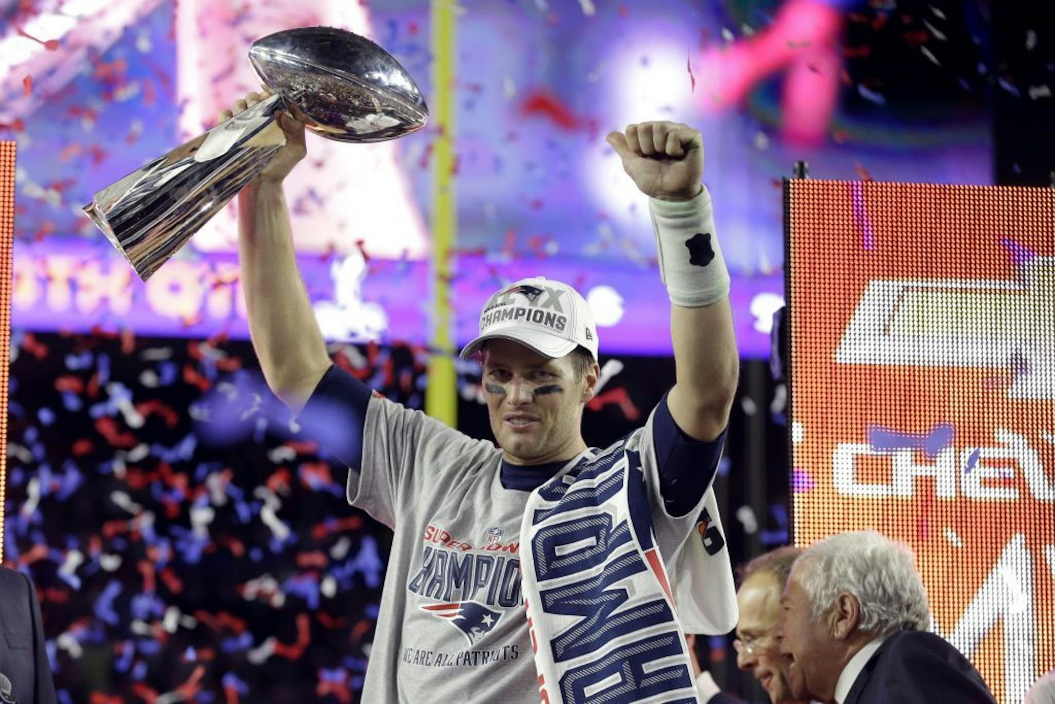 New England Patriots quarterback Tom Brady holds up Vince Lombardi Trophy after the Patriots defeated the Seattle Seahawks 28-24 in NFL Super Bowl XLIX football game Sunday, Feb. 1, 2015, in Glendale, Ariz.