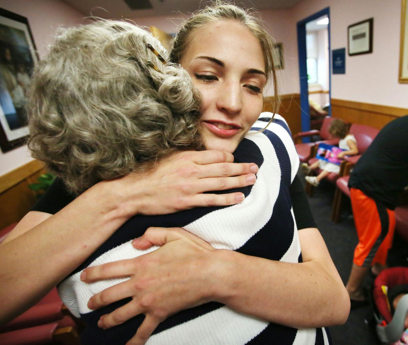 Here, Mary Jo Copeland gets a hug from Hannah Lease, who had been homeless and camping with her family when they came to Copeland for shelter at her original facility, Sharing and Caring Hands Thursday, July 16, 2015, in Minneapolis, MN. Copeland gave them a room as well as $200 and gift cards.](DAVID JOLES/STARTRIBUNE)djoles@startribune.com Fifteen years ago, Mary Jo Copeland set off on a high-profile campaign to build a 200-bed orphanage. Since then, she has struggled to raise the $30 million