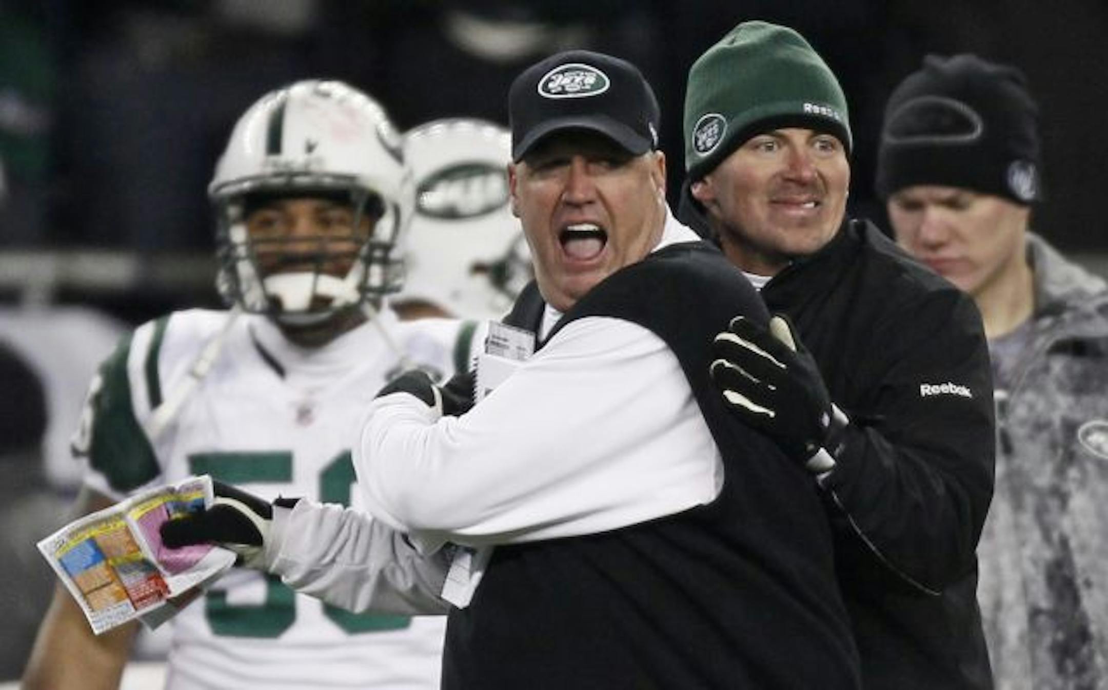 Jets coach Rex Ryan (center)
