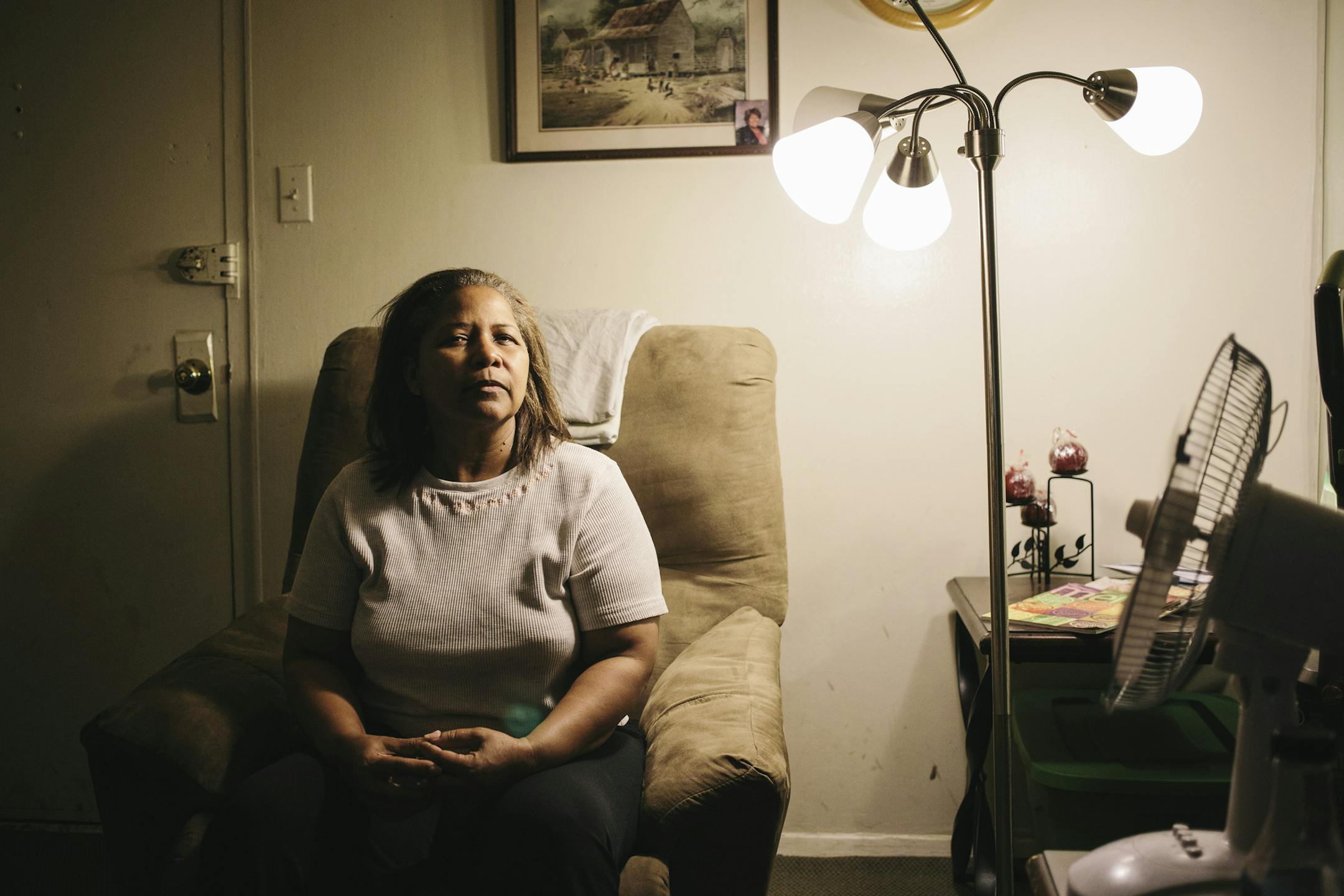 Gloria Spottswood, who can barley afford her health insurance through the Affordable Care Act even with a federal subsidy, at her home in Alexandria, Va., July 23, 2014. A court recently ruled that subsidies could be awarded only in states with their own insurance exchanges, not those using the federal exchange, like Virginia, which has raised the possibility that many of the people found eligible for subsidized insurance on federal exchange would drop their new coverage. (Lexey Swall/The New Yo