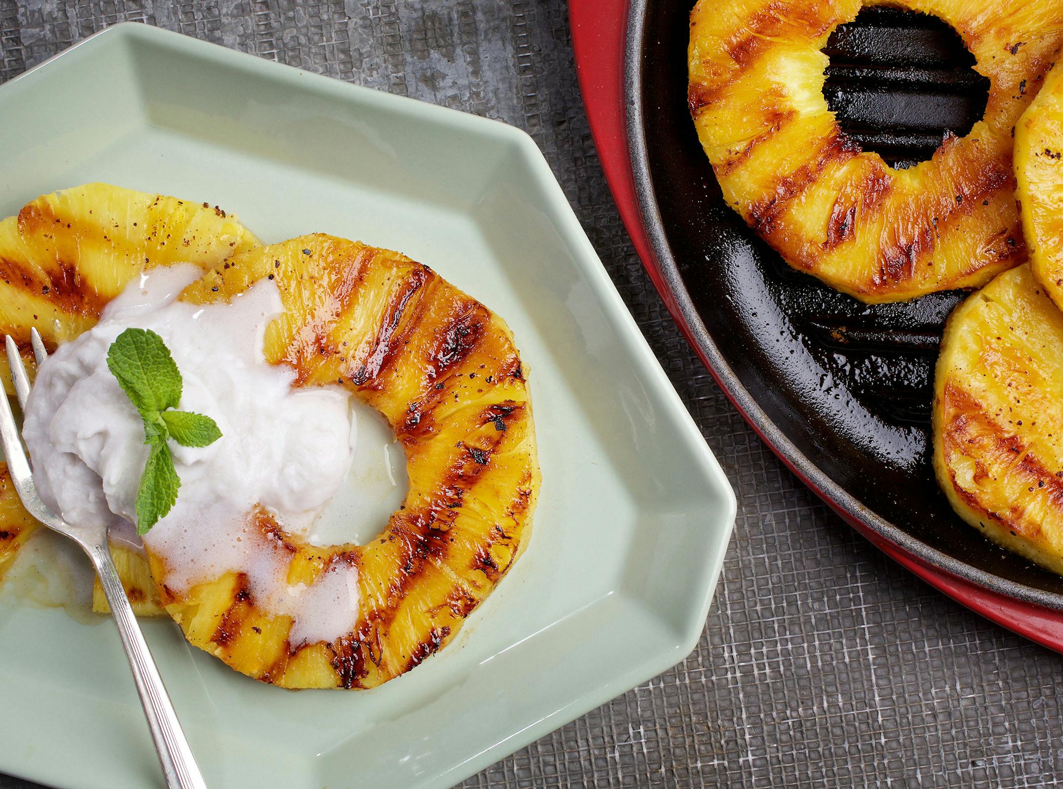 Grilled Pineapple With Coconut Whipped Cream. MUST CREDIT: Photo by Deb Lindsey for The Washington Post.