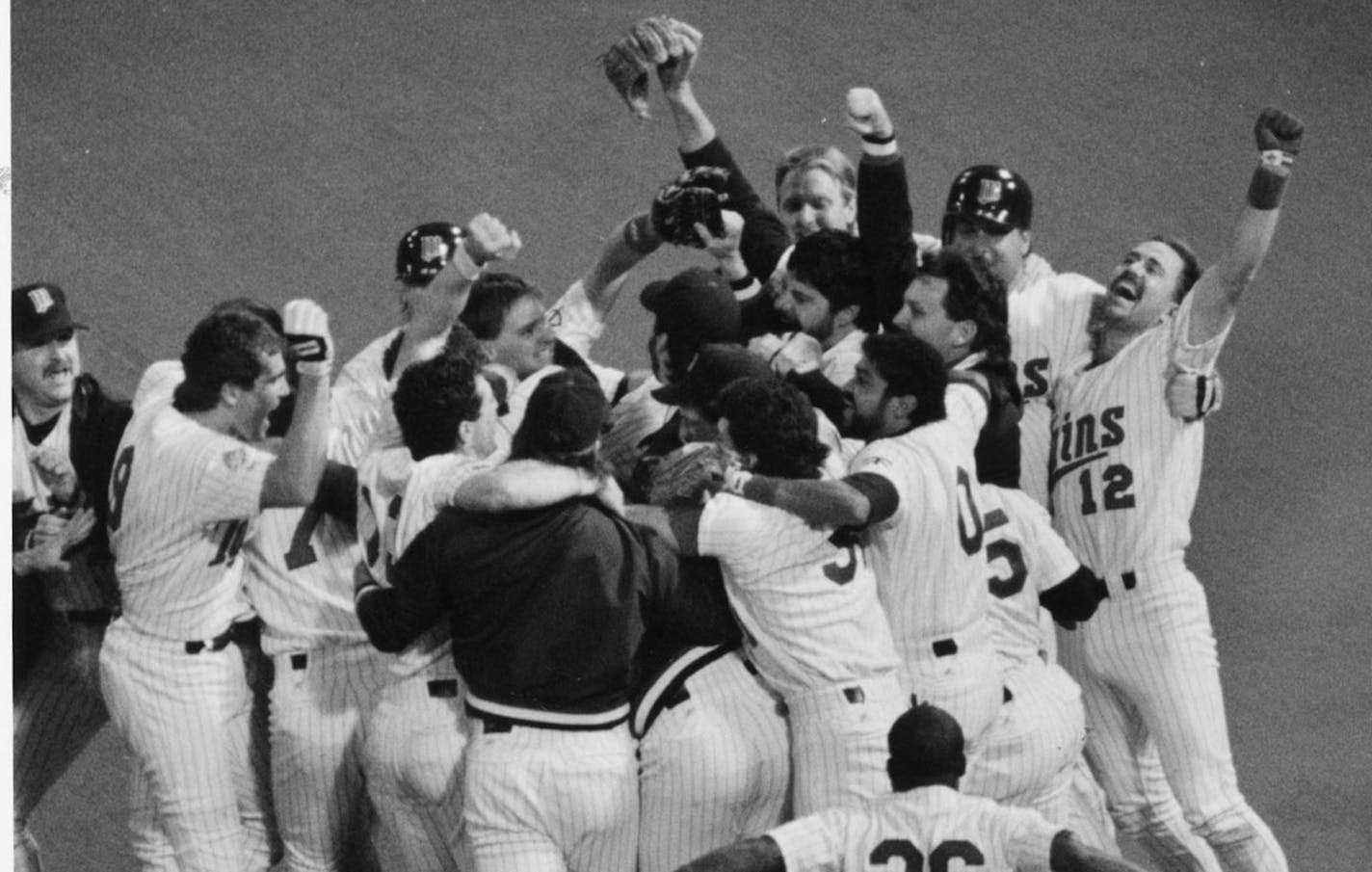 The Minnesota Twins win the 1991 World Series / It was an emotionally draining Series for both players and fans, but the Twins had no trouble celebrating their championship. Star Tribune staff photo by Joey McLeister, ran on Oct. 28, 1991.